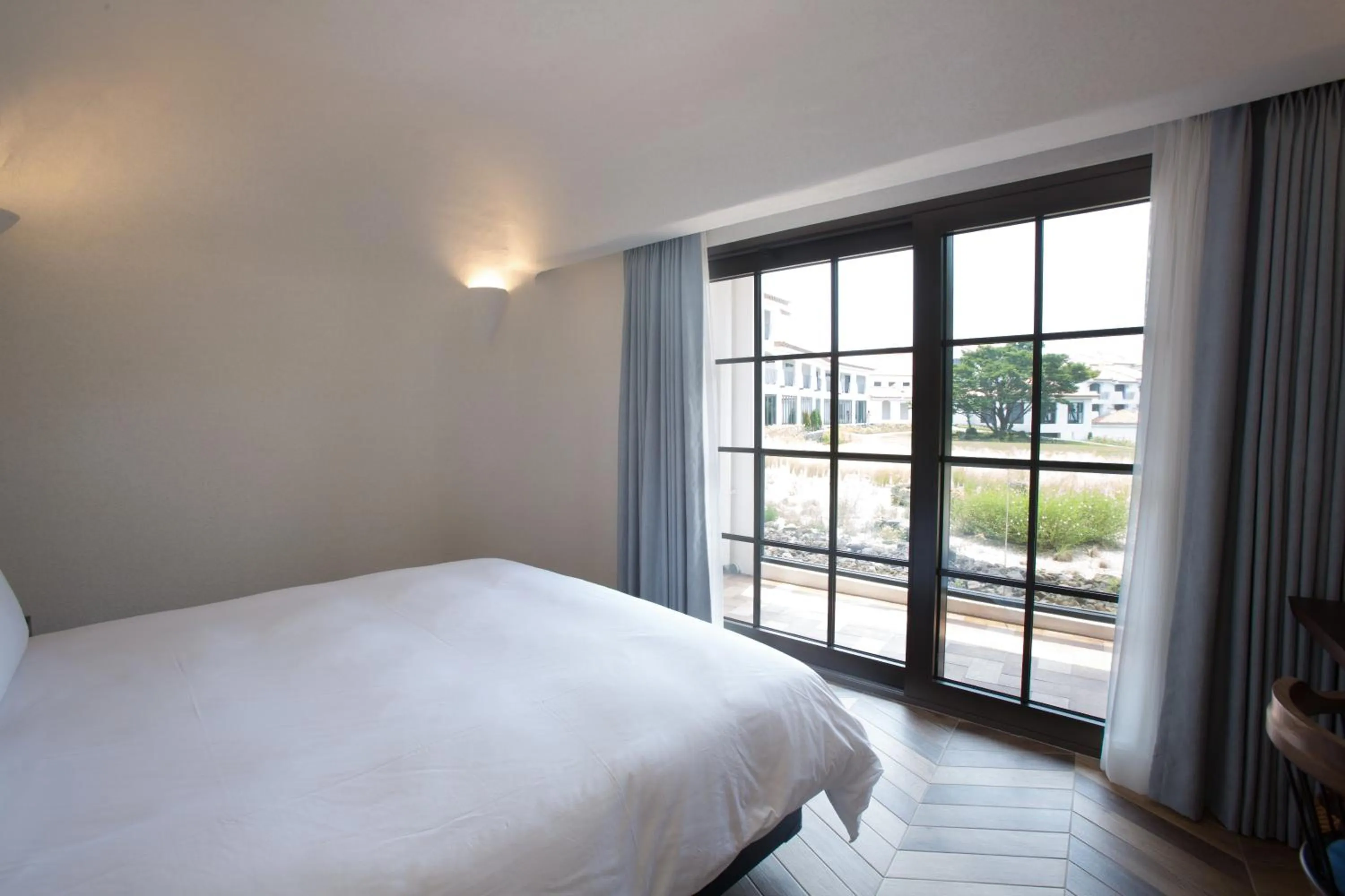 Bed in Ecoland Hotel