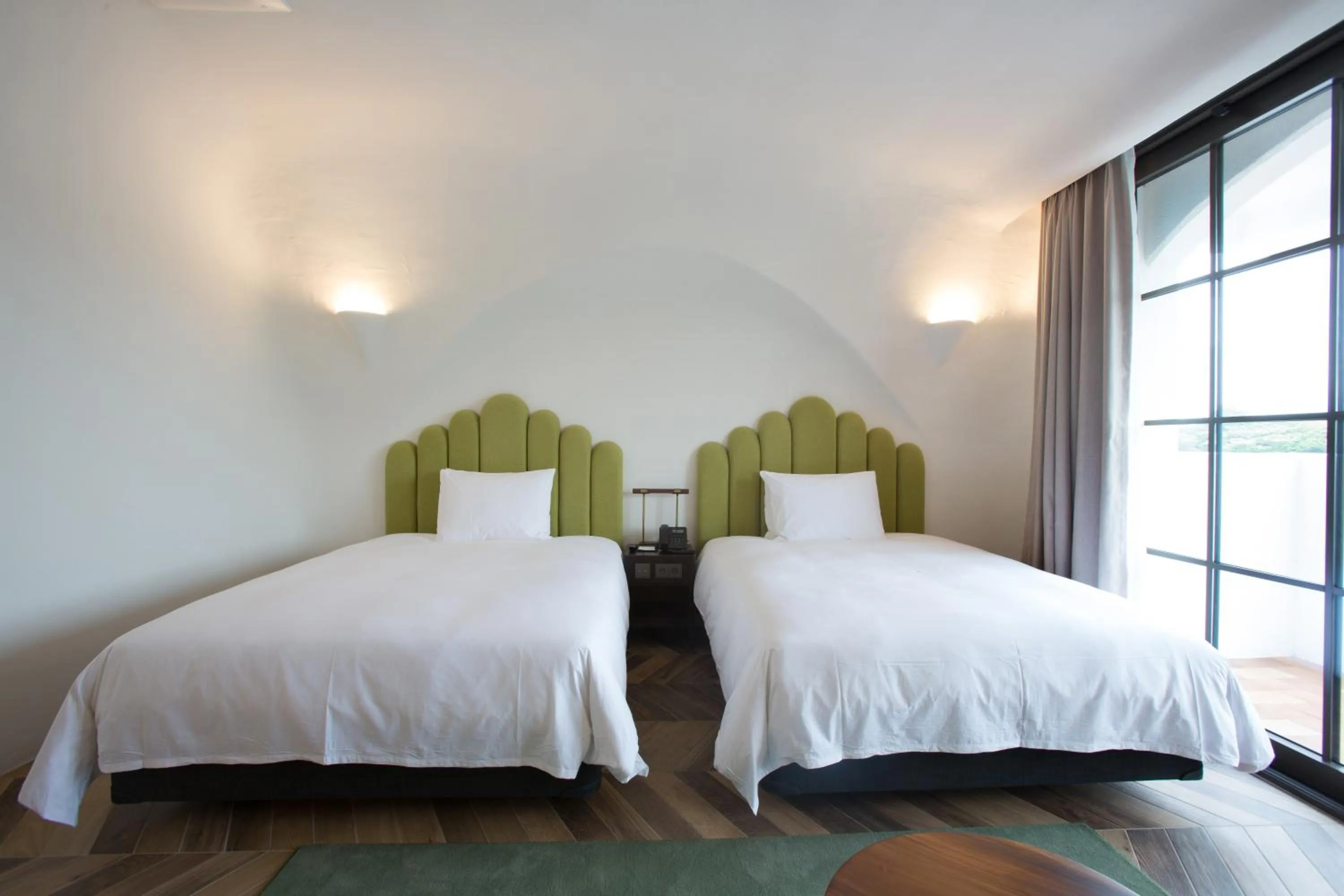 Bed in Ecoland Hotel