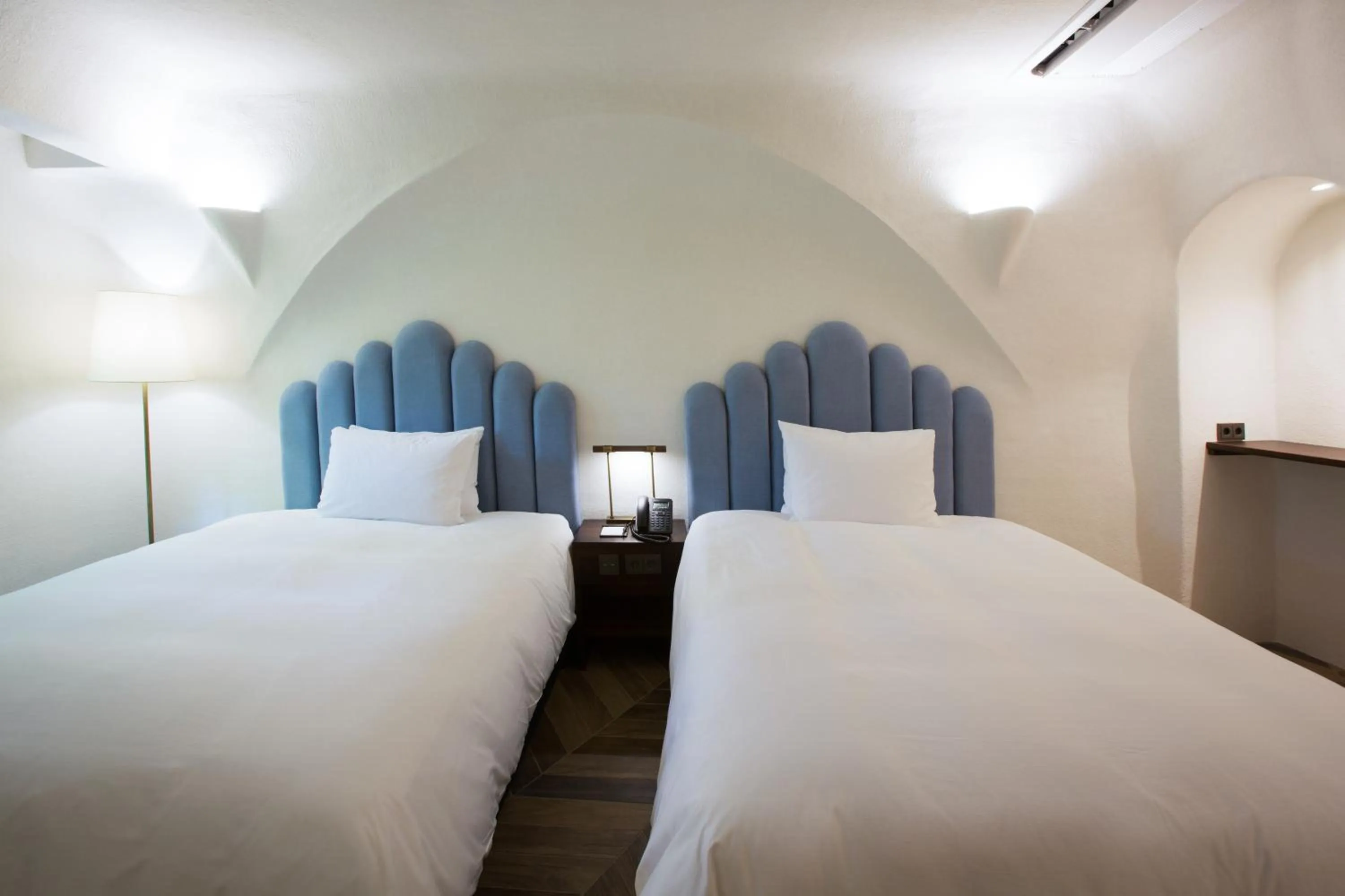 Bed in Ecoland Hotel