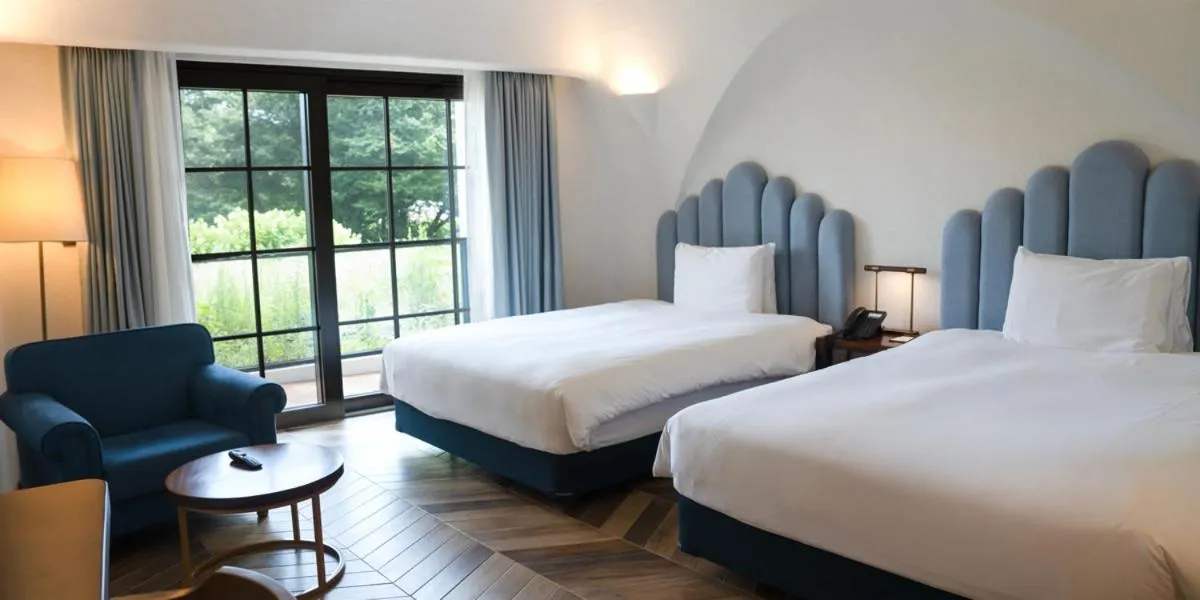 Bed in Ecoland Hotel