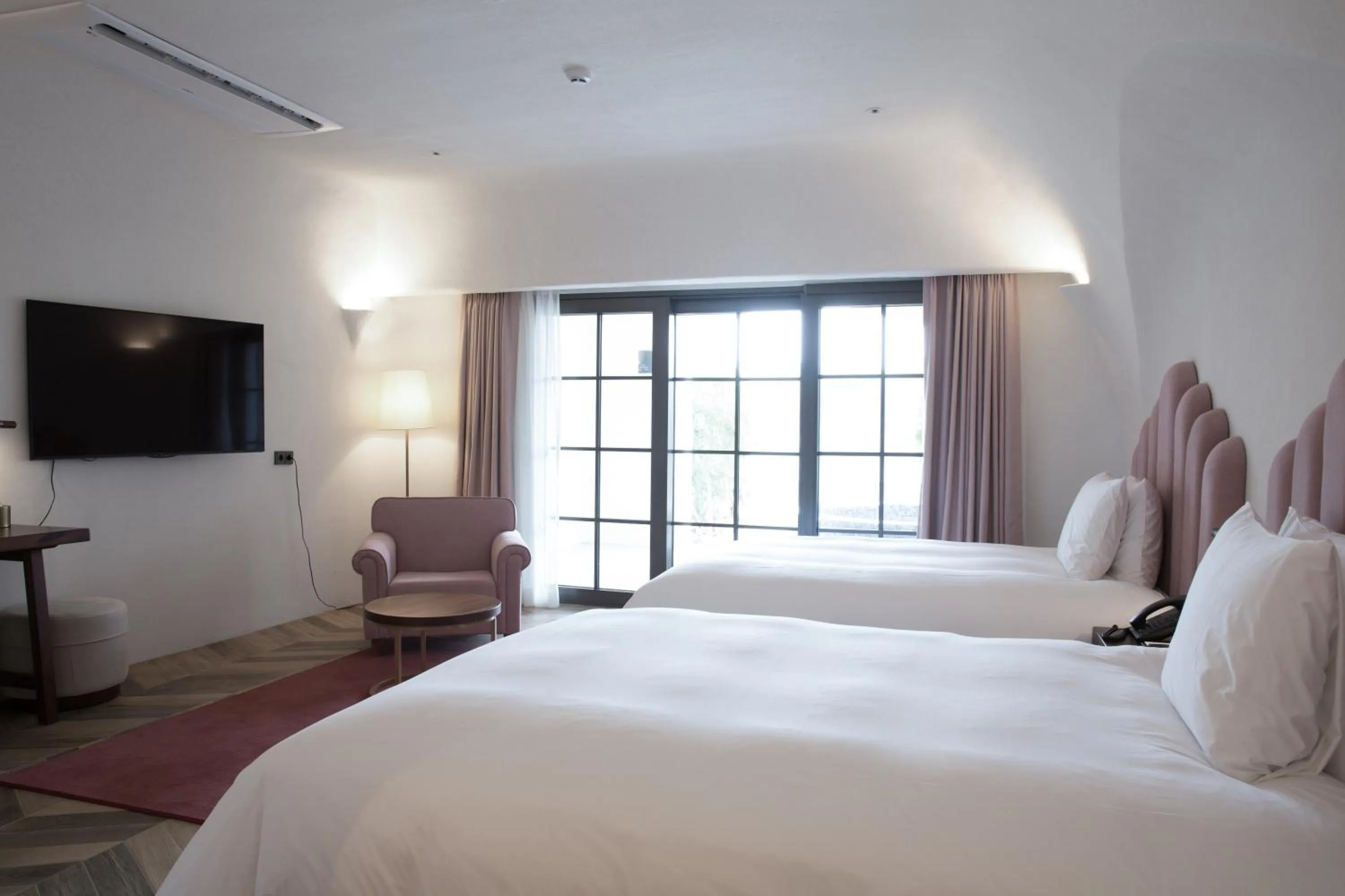 Bed in Ecoland Hotel