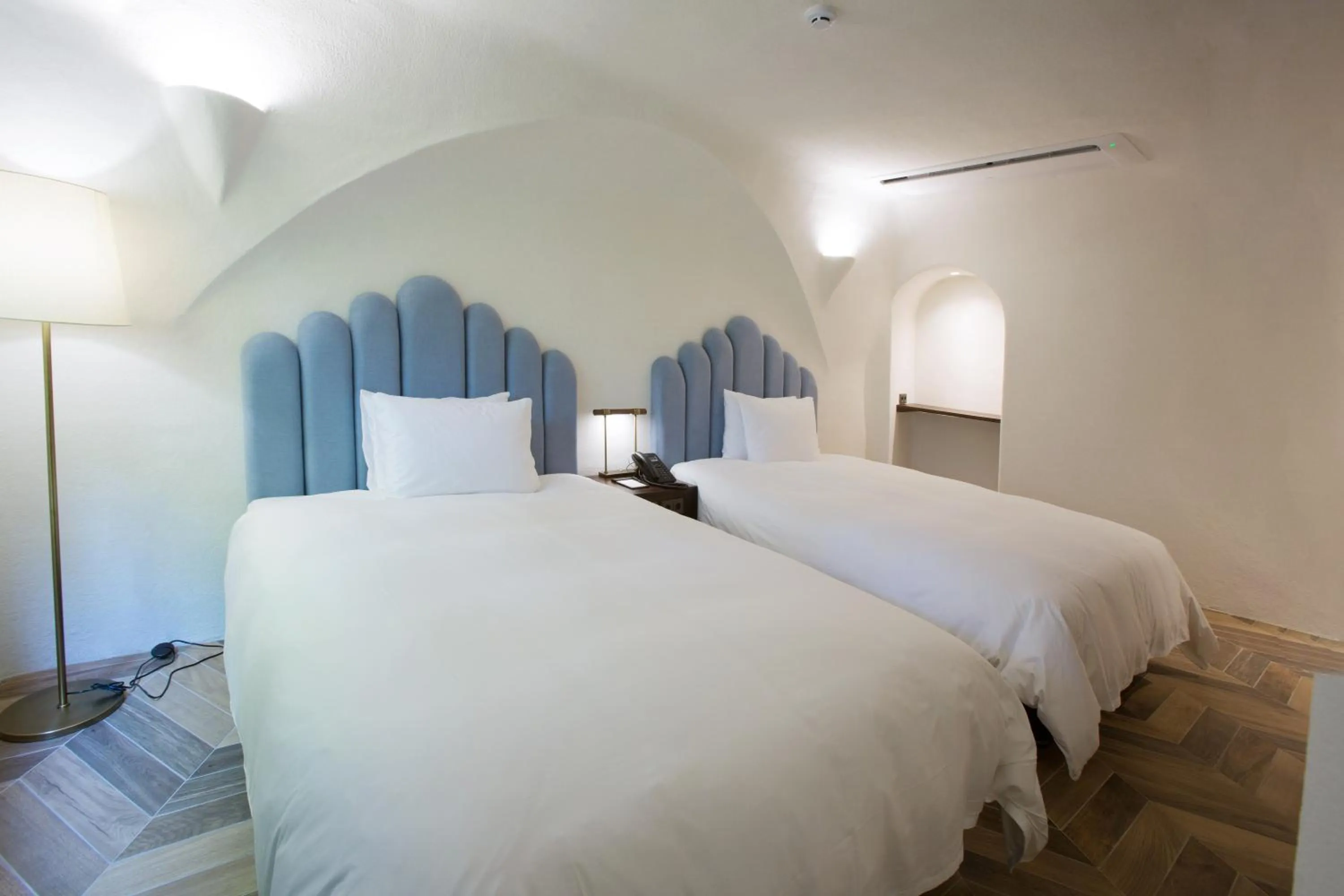 Bed in Ecoland Hotel