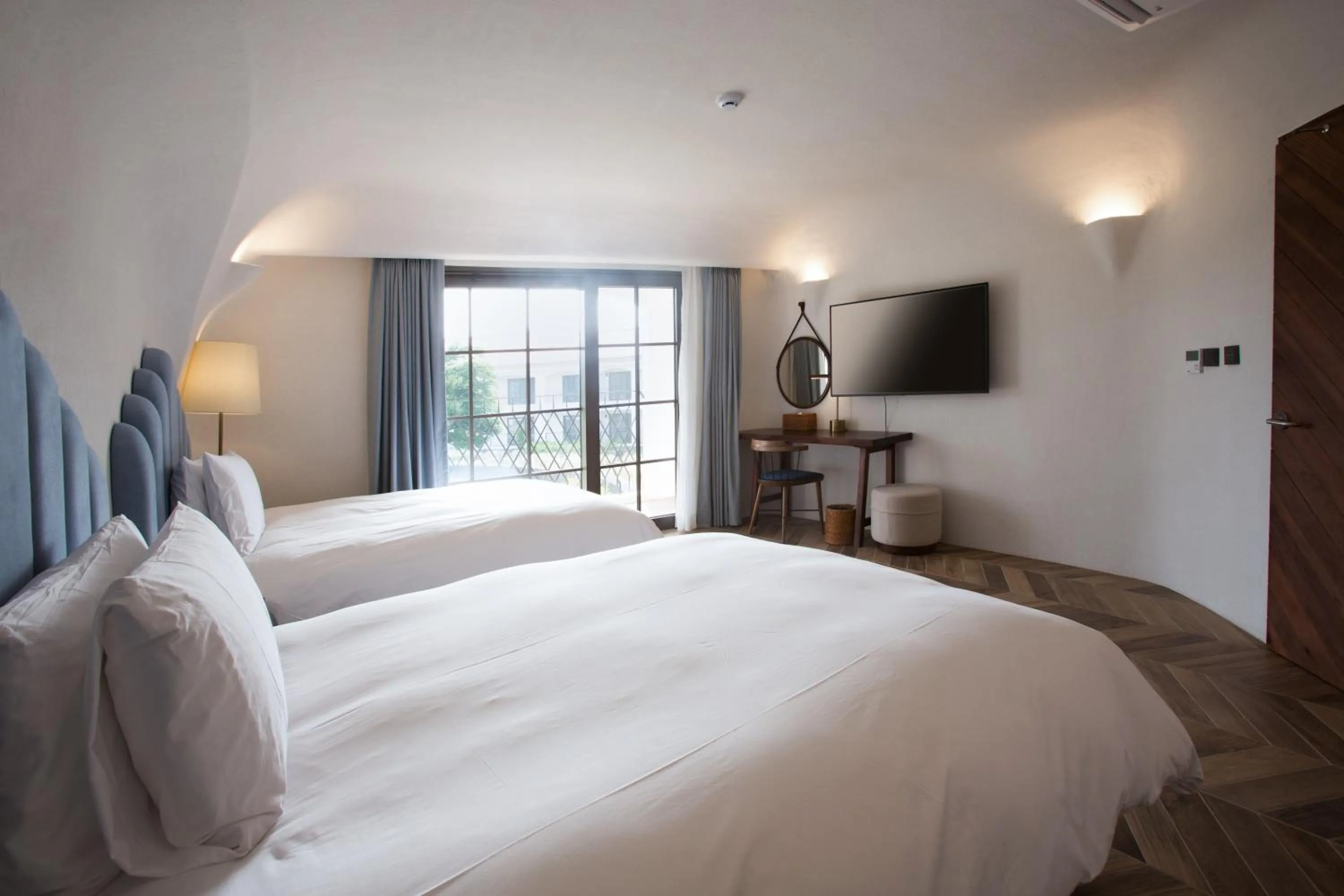 Bed in Ecoland Hotel