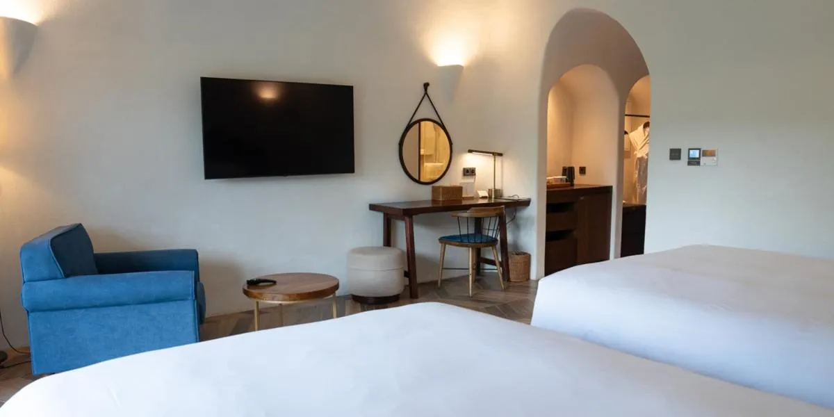 Bed in Ecoland Hotel