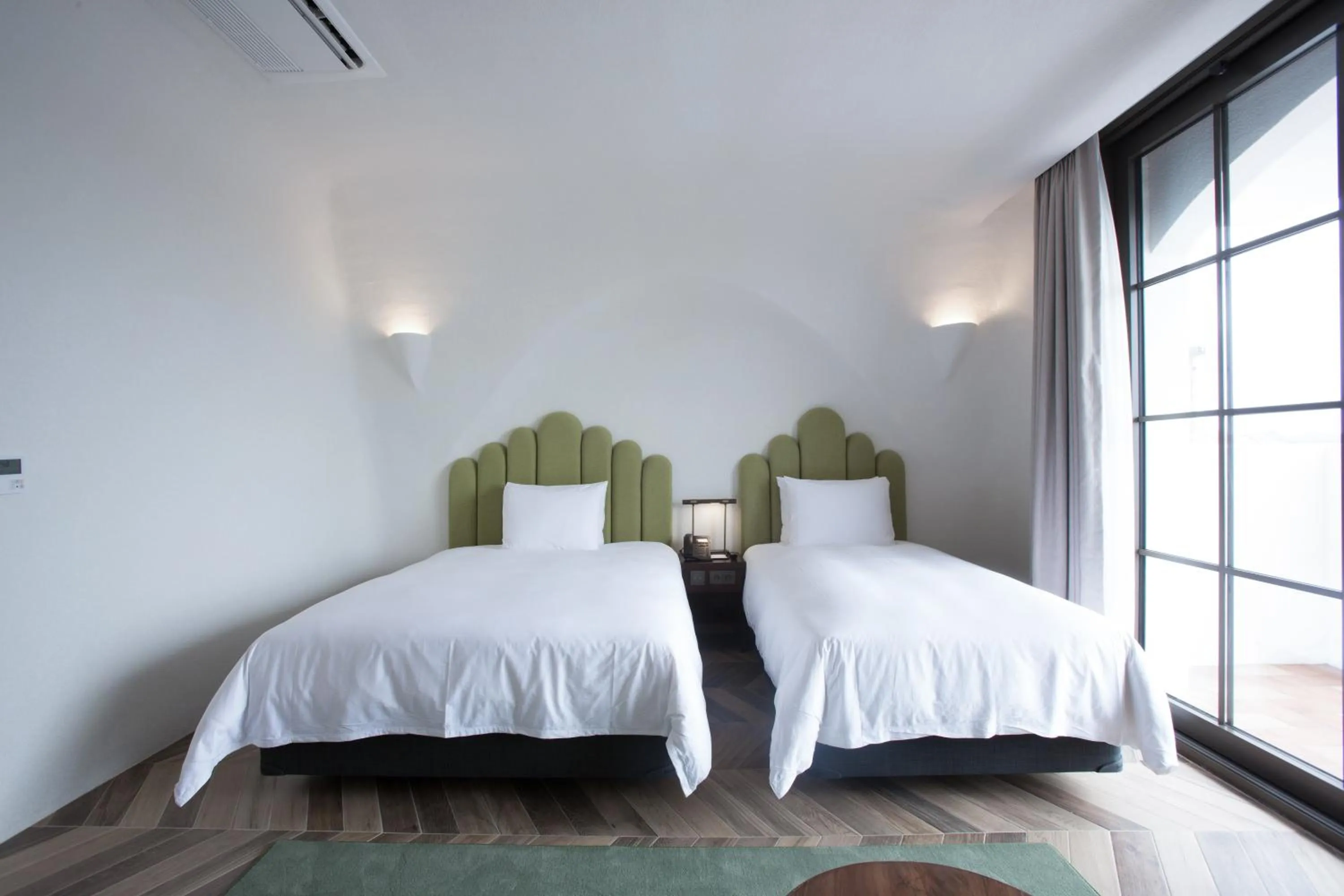 Bed in Ecoland Hotel