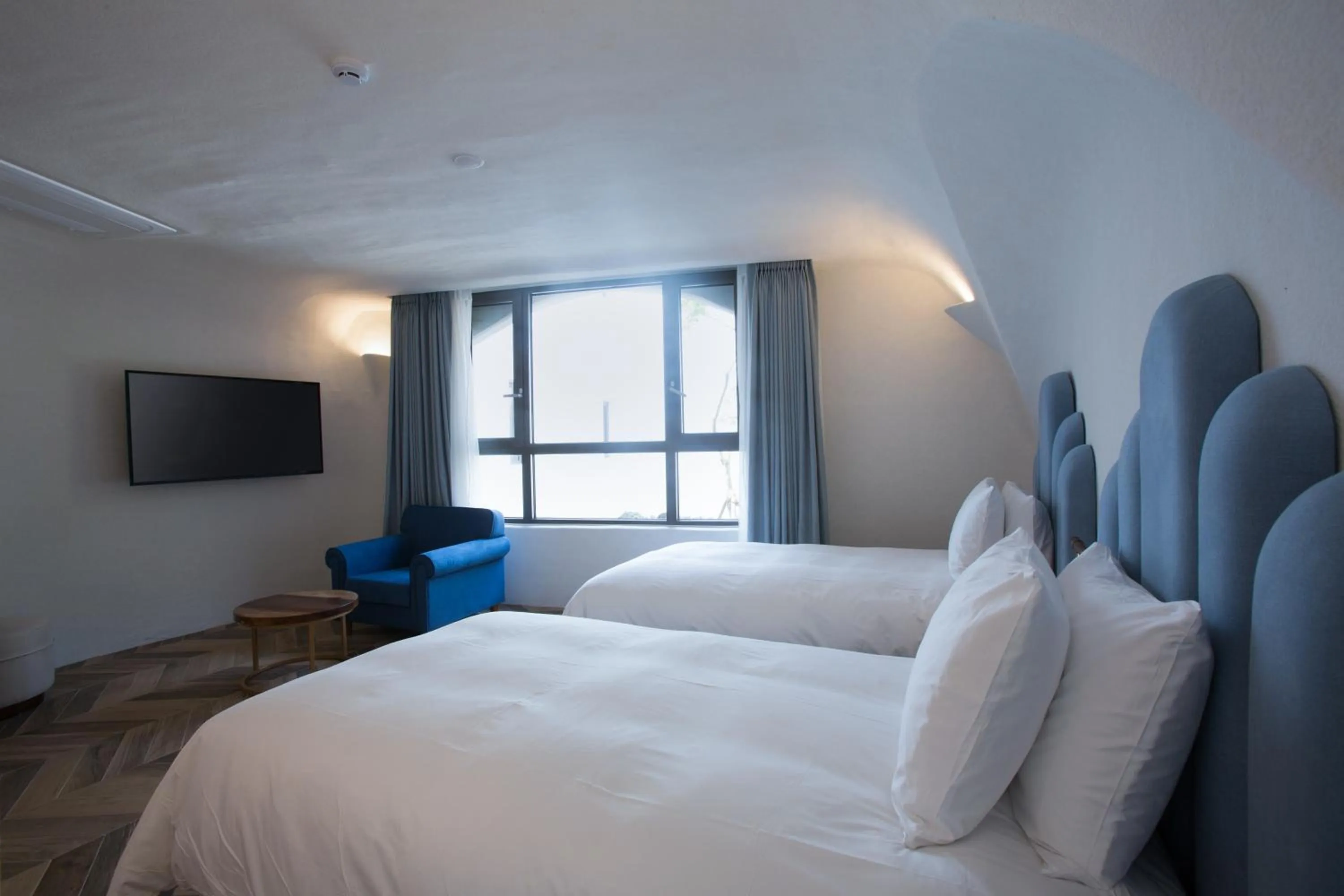 Bed in Ecoland Hotel