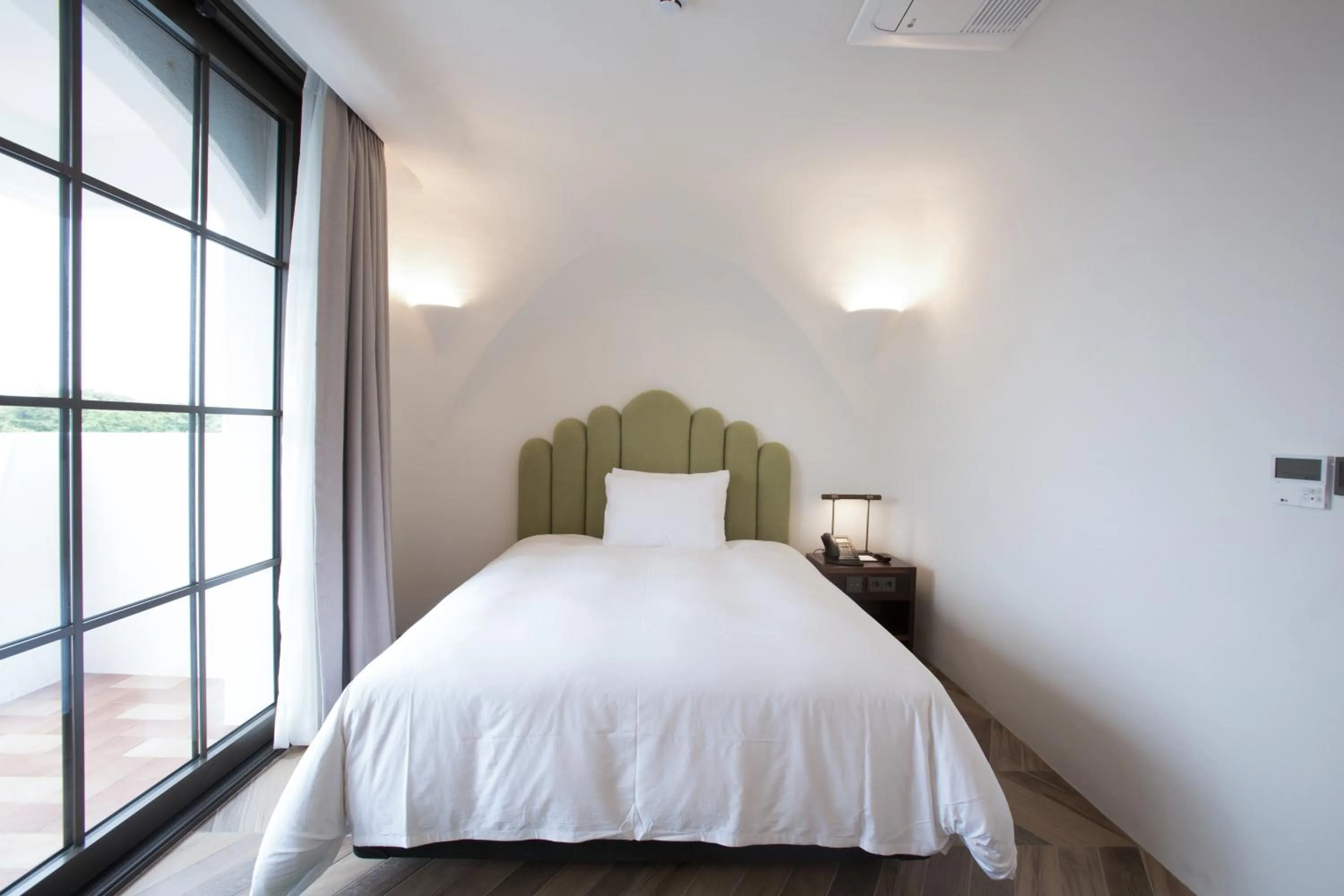 Bed in Ecoland Hotel