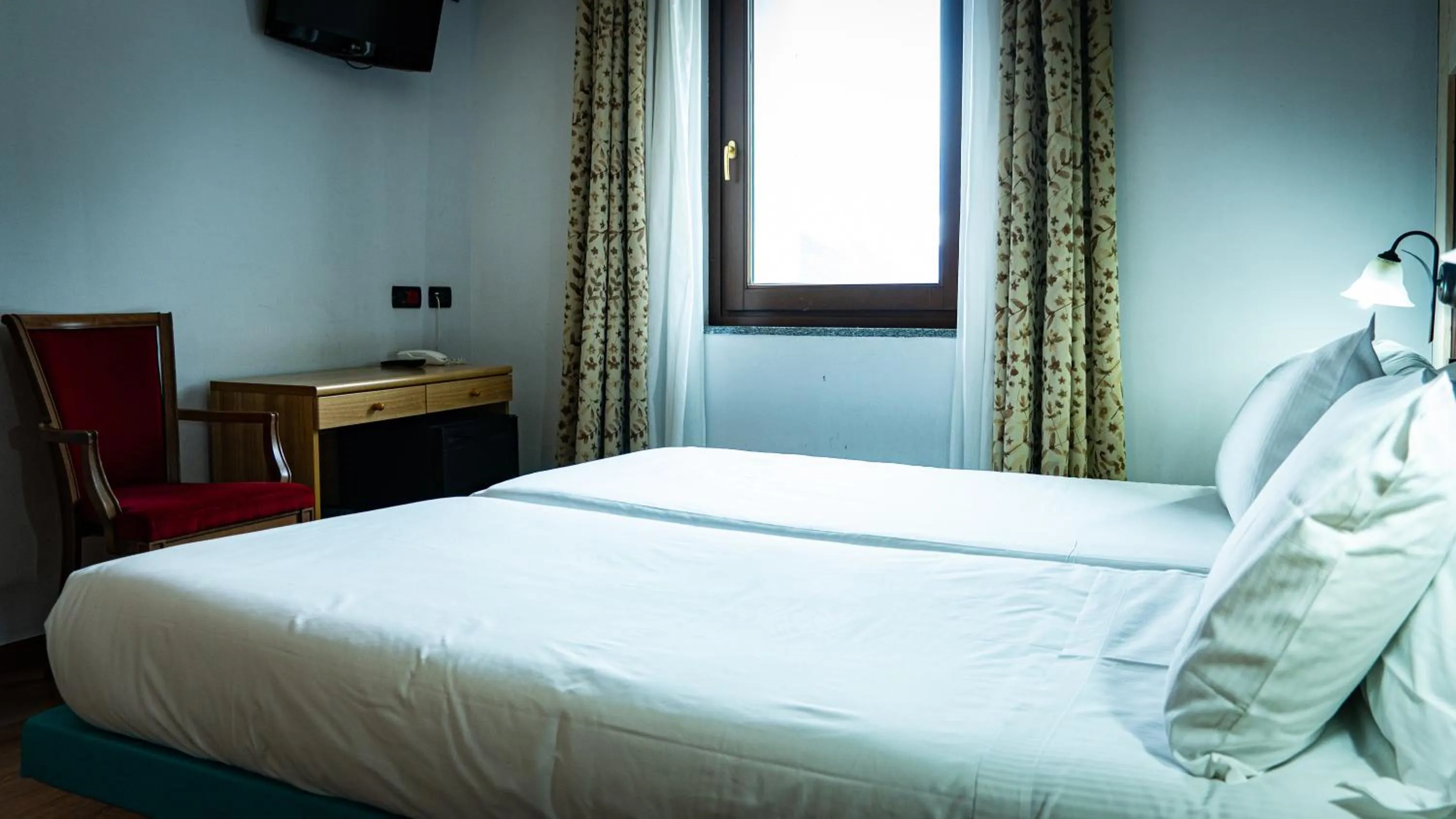 Bed in Hotel Au Soleil