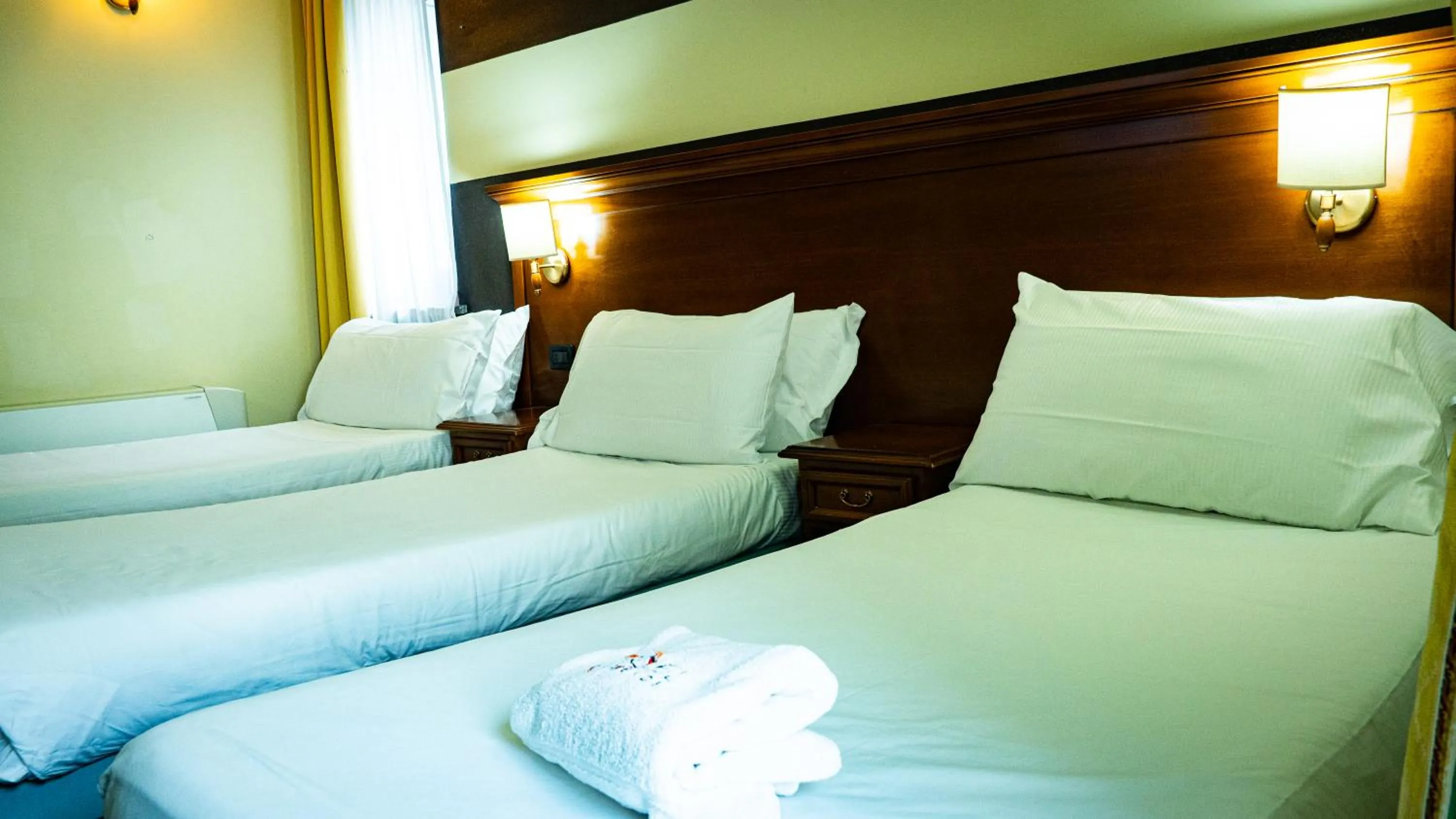 Bed in Hotel Au Soleil