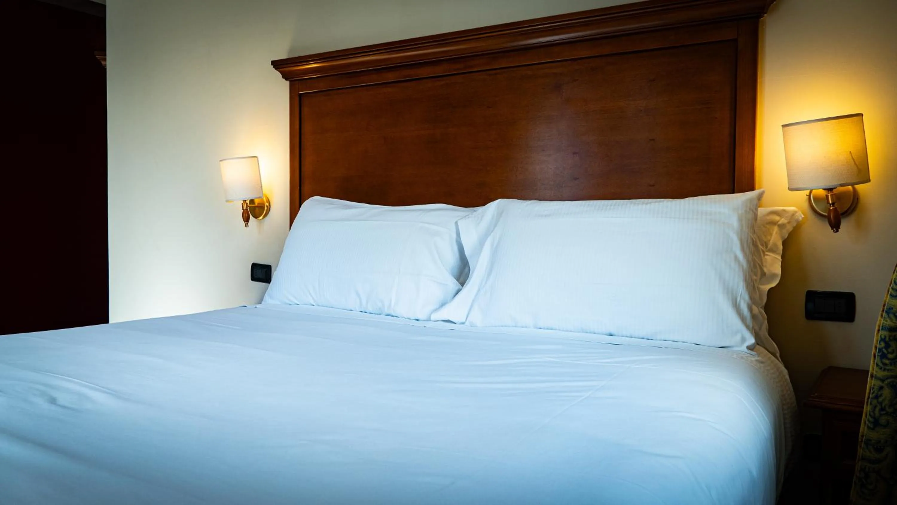 Bed in Hotel Au Soleil