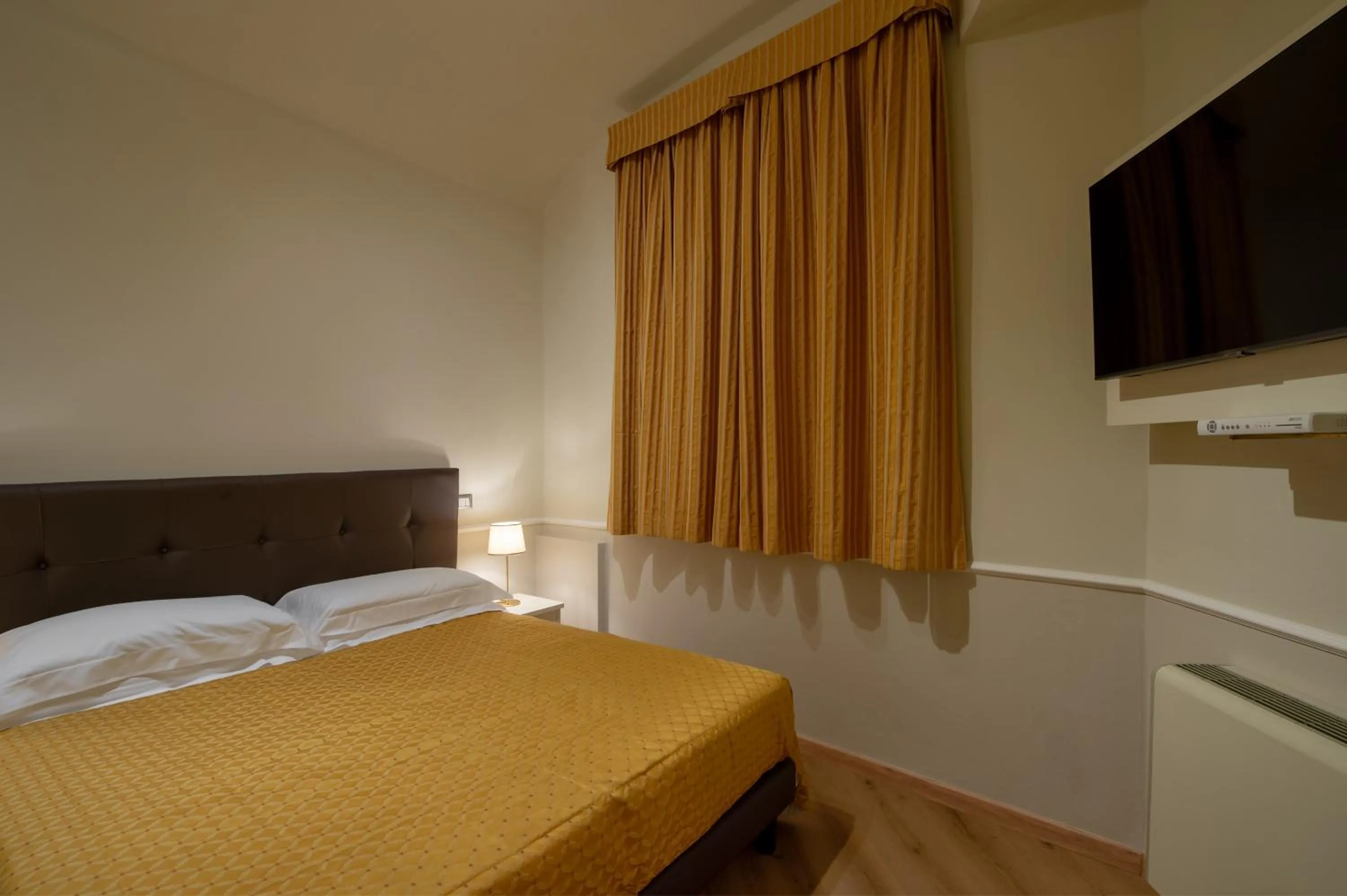 Bed in Albergo Reggio