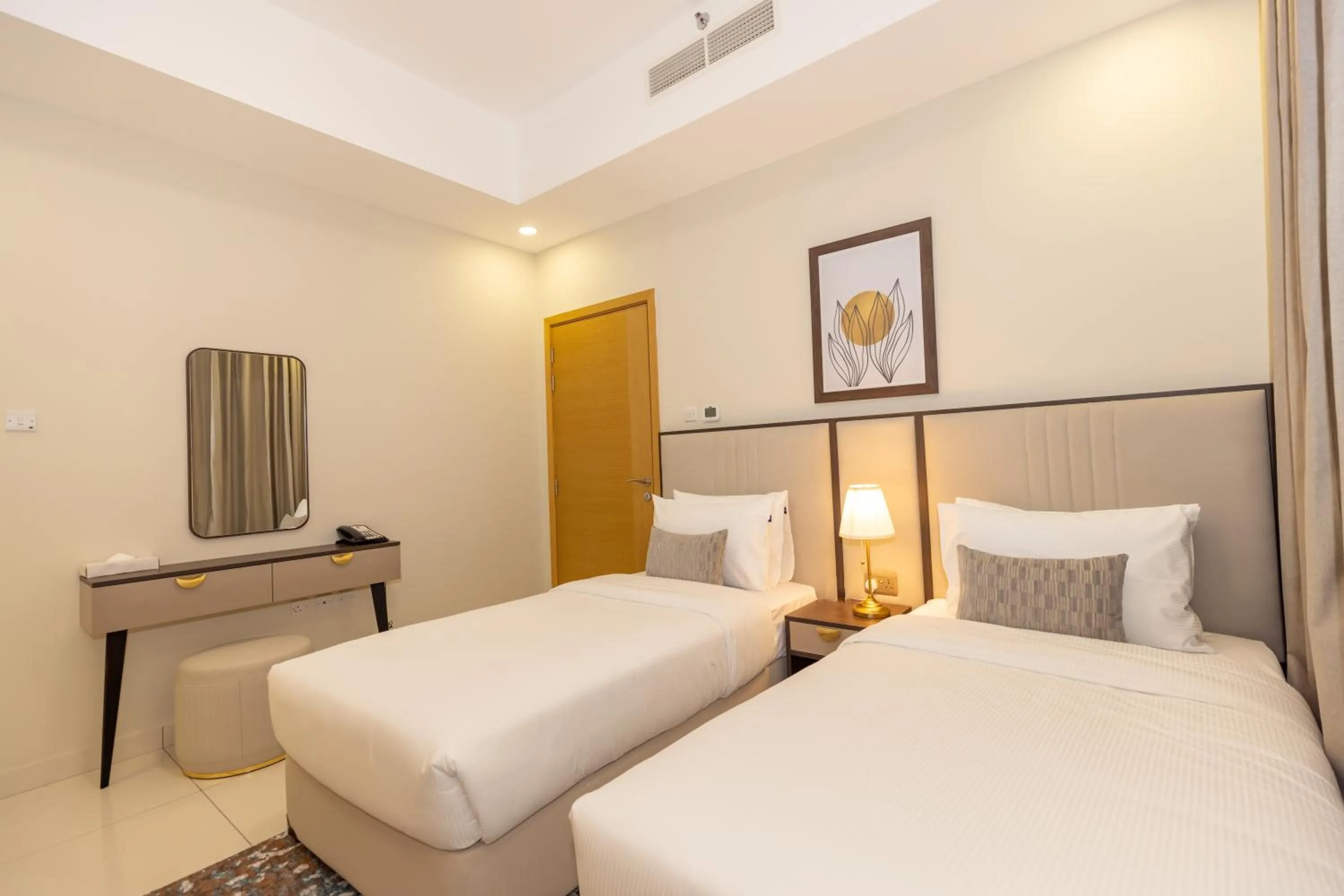 Bed in Platinum Coast Hotel Apartments