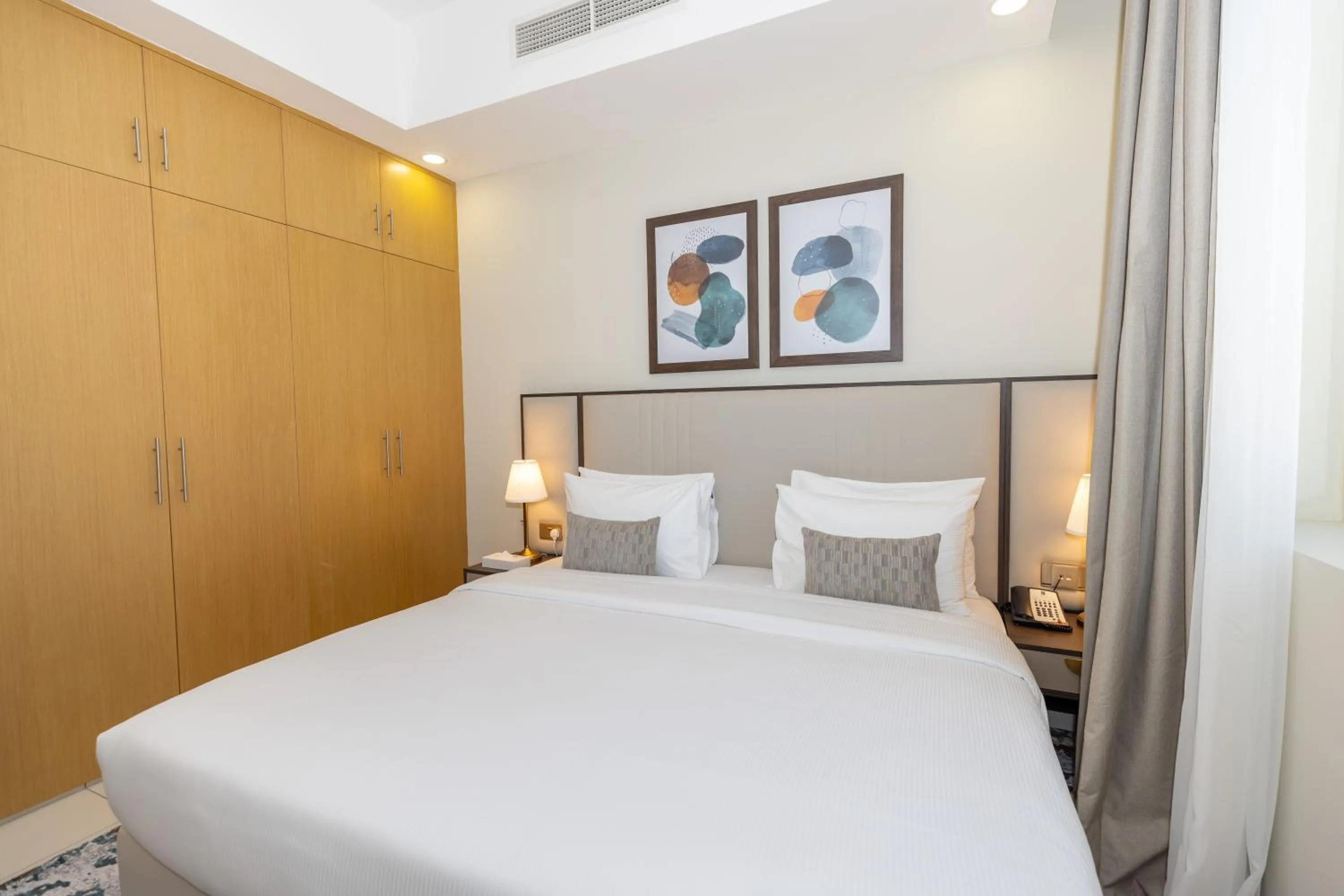 Bed in Platinum Coast Hotel Apartments