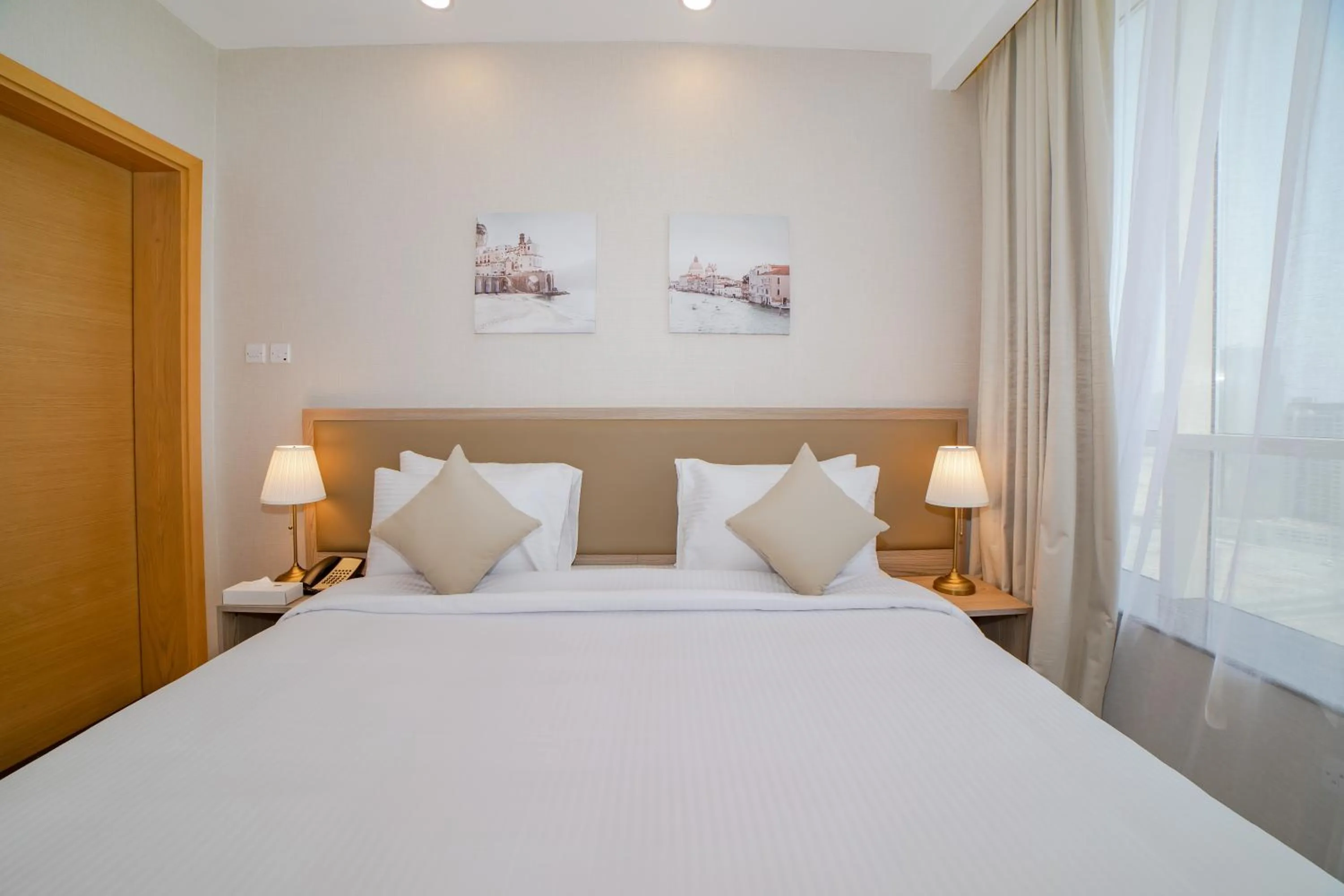 Bed in Platinum Coast Hotel Apartments