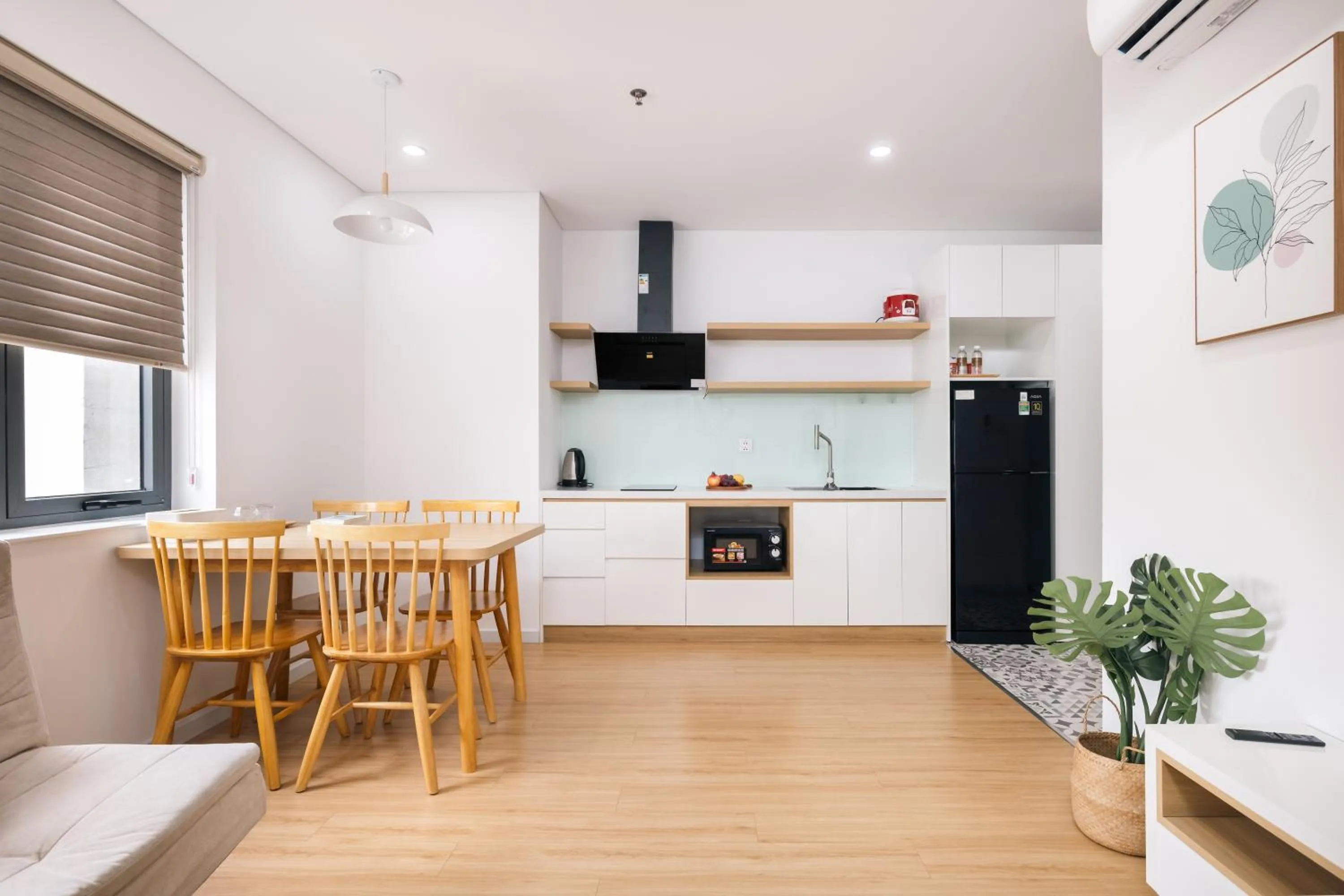 Kitchen or kitchenette in LAGOM APARTMENT AND HOTEL