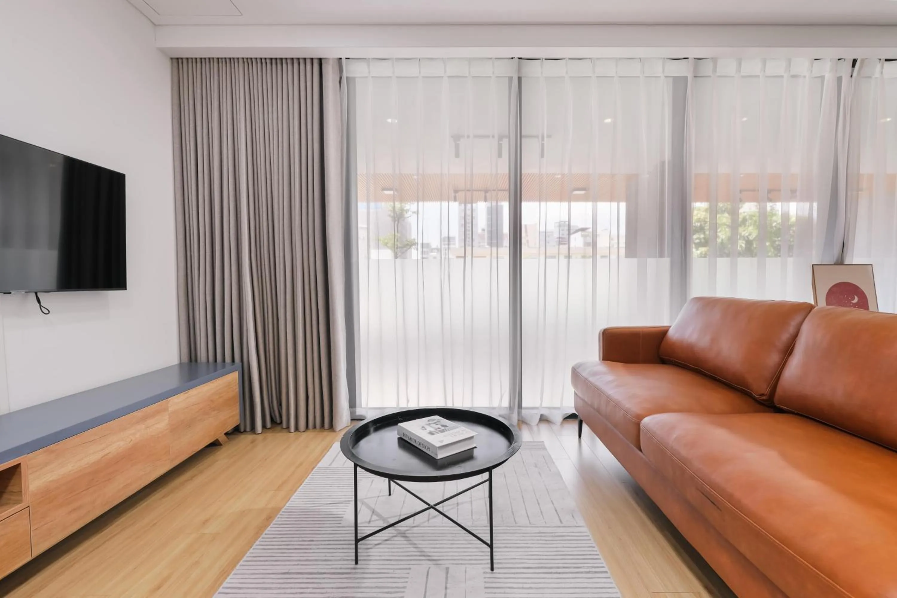 Communal lounge/ TV room in LAGOM APARTMENT AND HOTEL