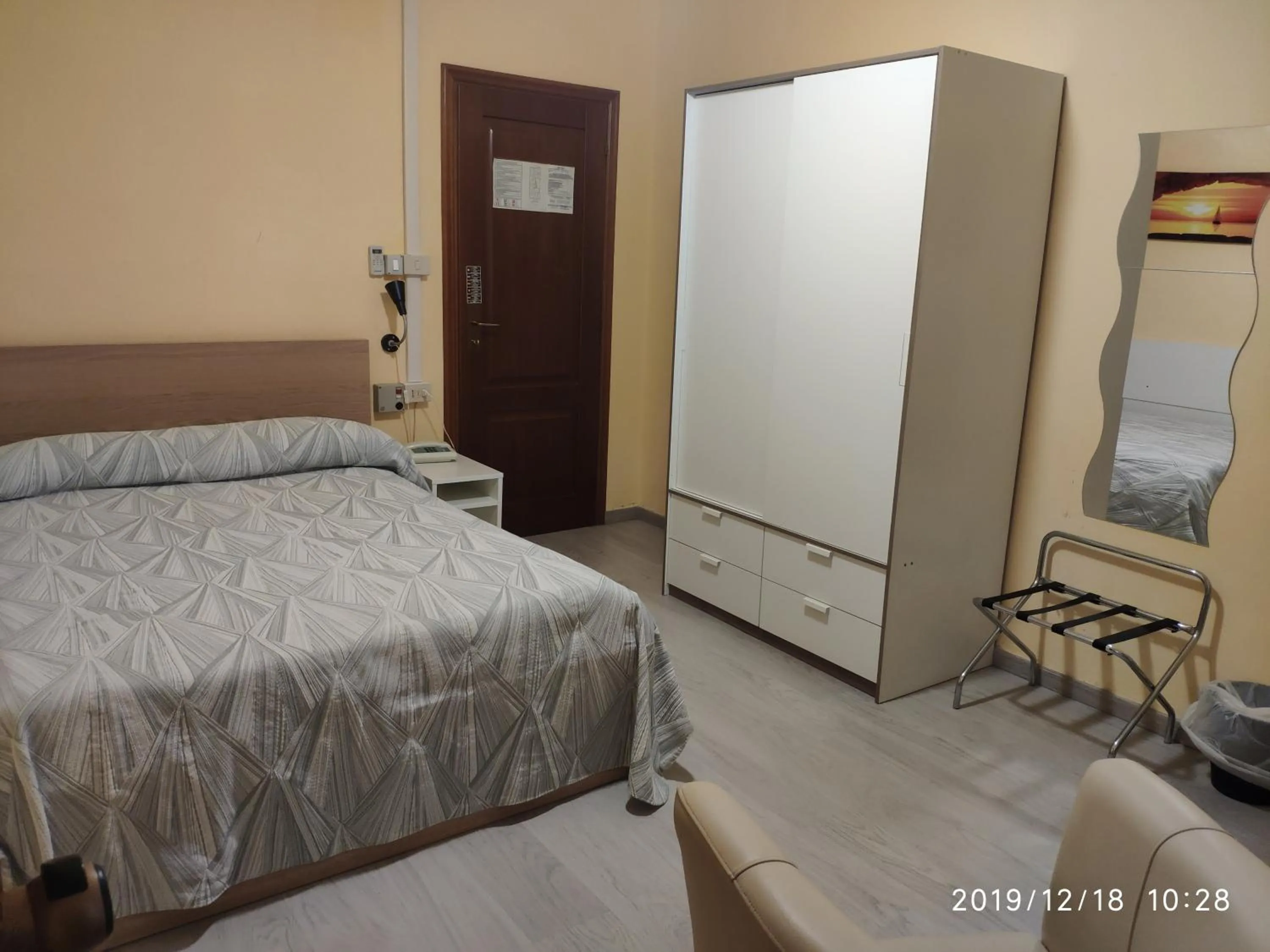 Bed in Giappone Inn Parking Hotel