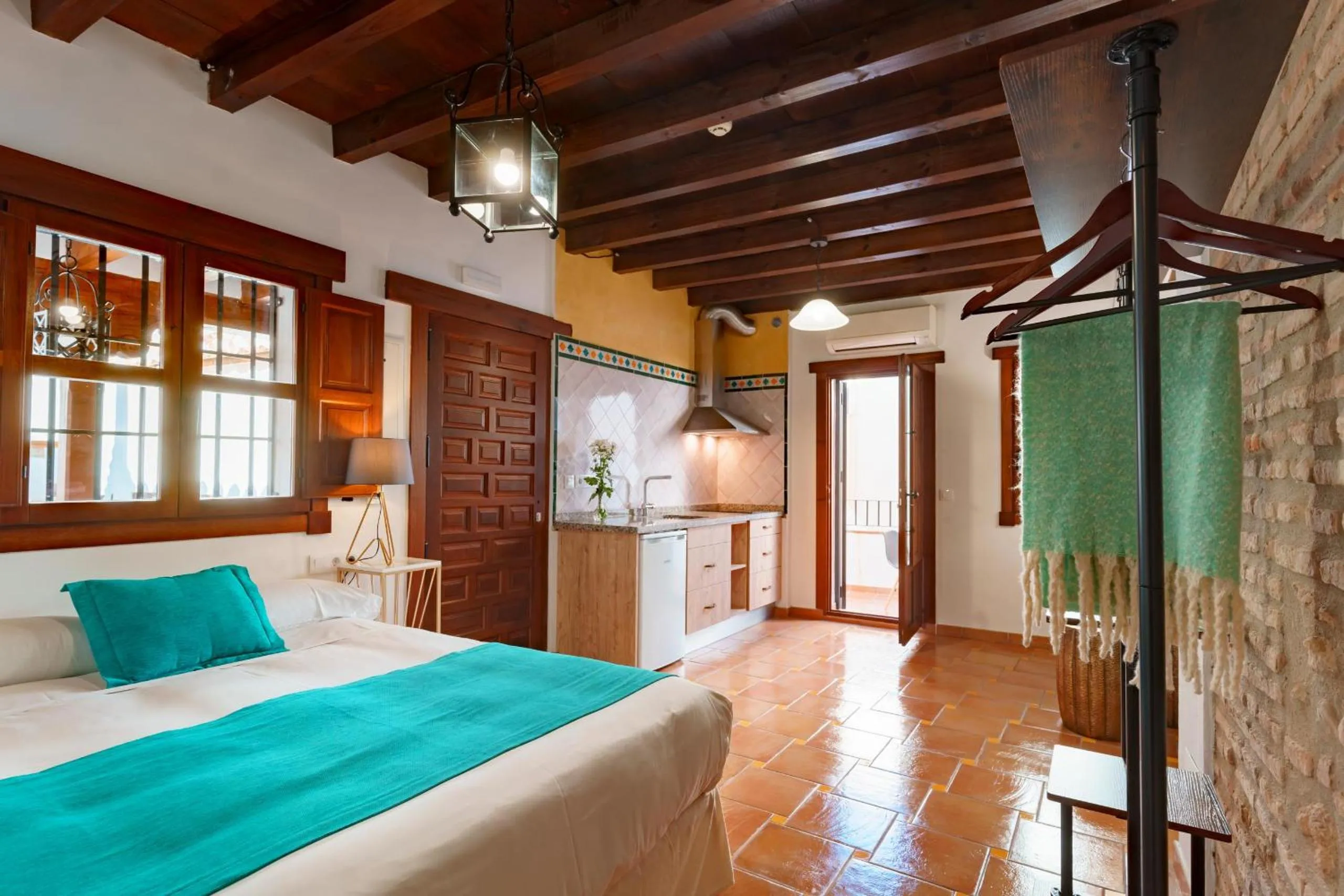 Bed in SUITES CASA DE LAS COLUMNAS