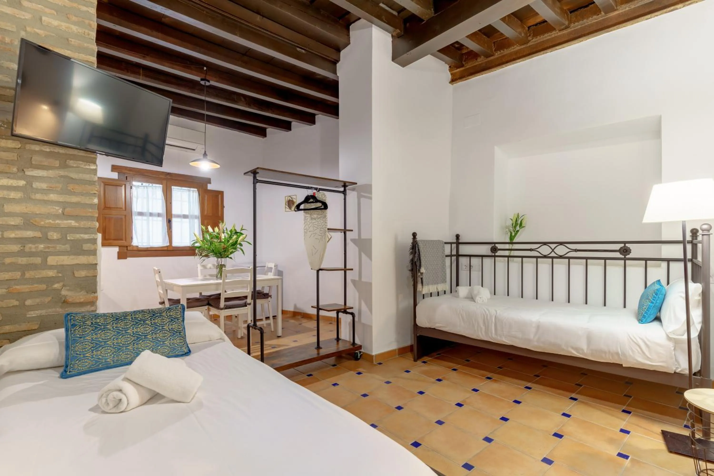 Bed in SUITES CASA DE LAS COLUMNAS