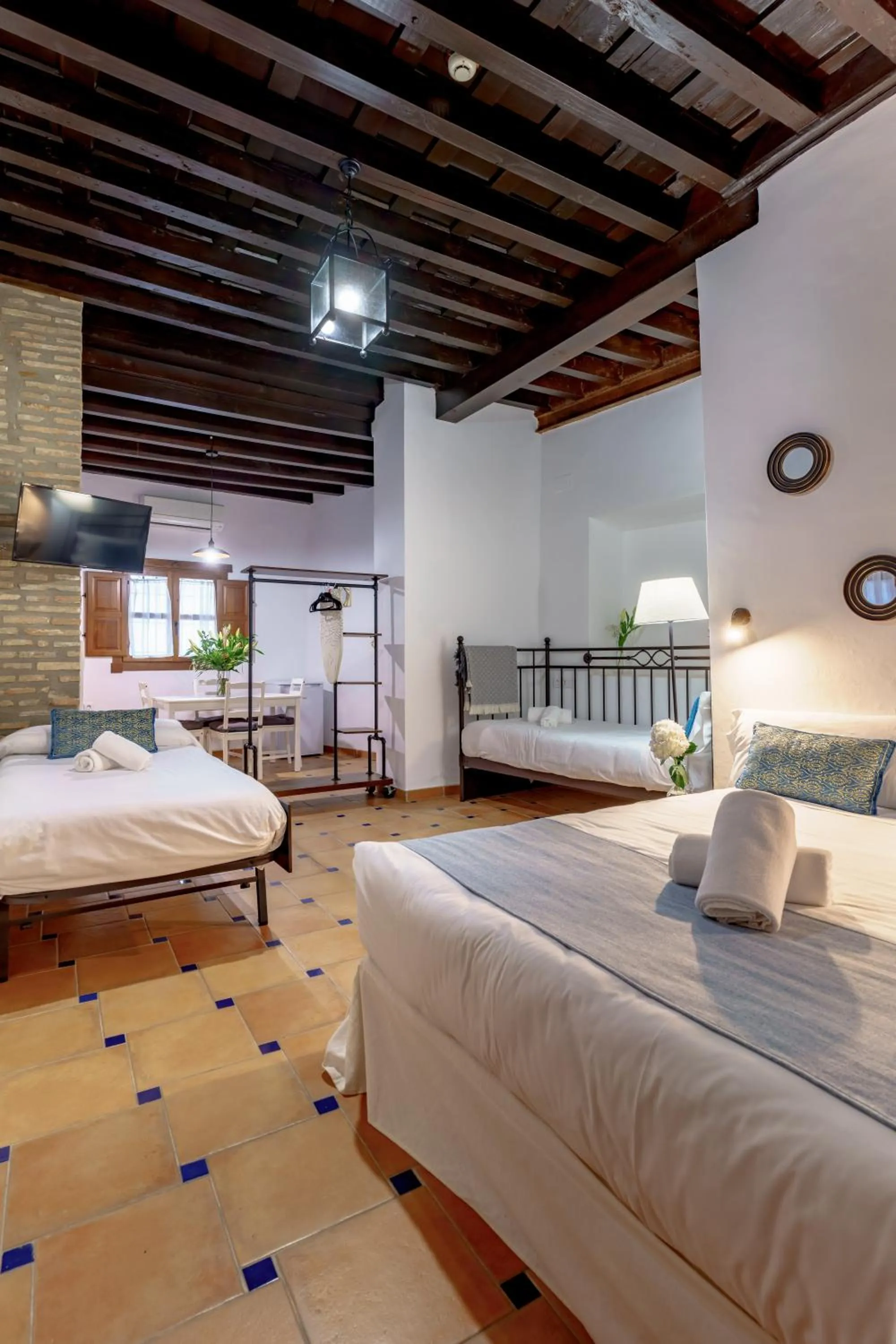 Bed in SUITES CASA DE LAS COLUMNAS