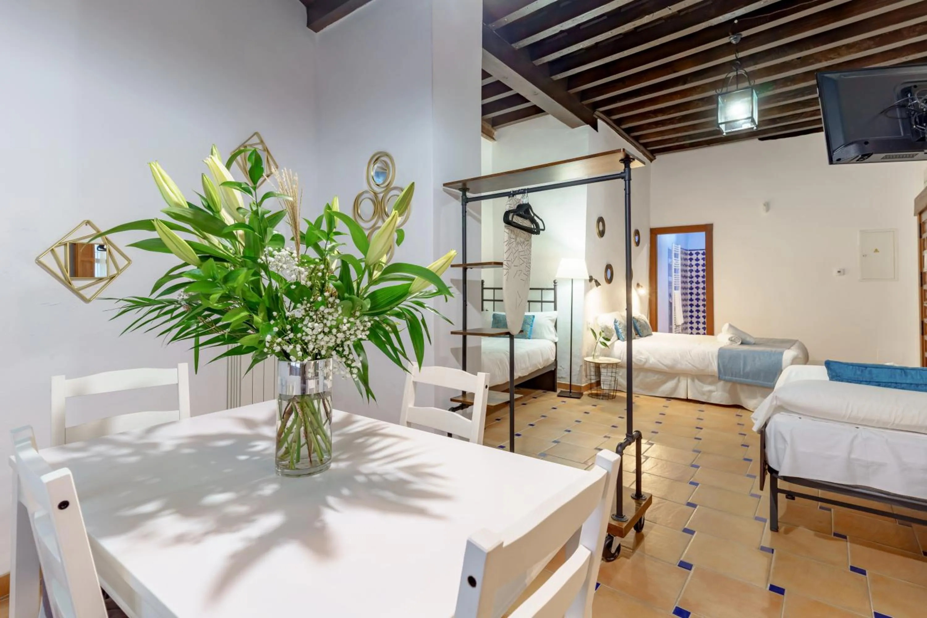 Living room, Bed in SUITES CASA DE LAS COLUMNAS