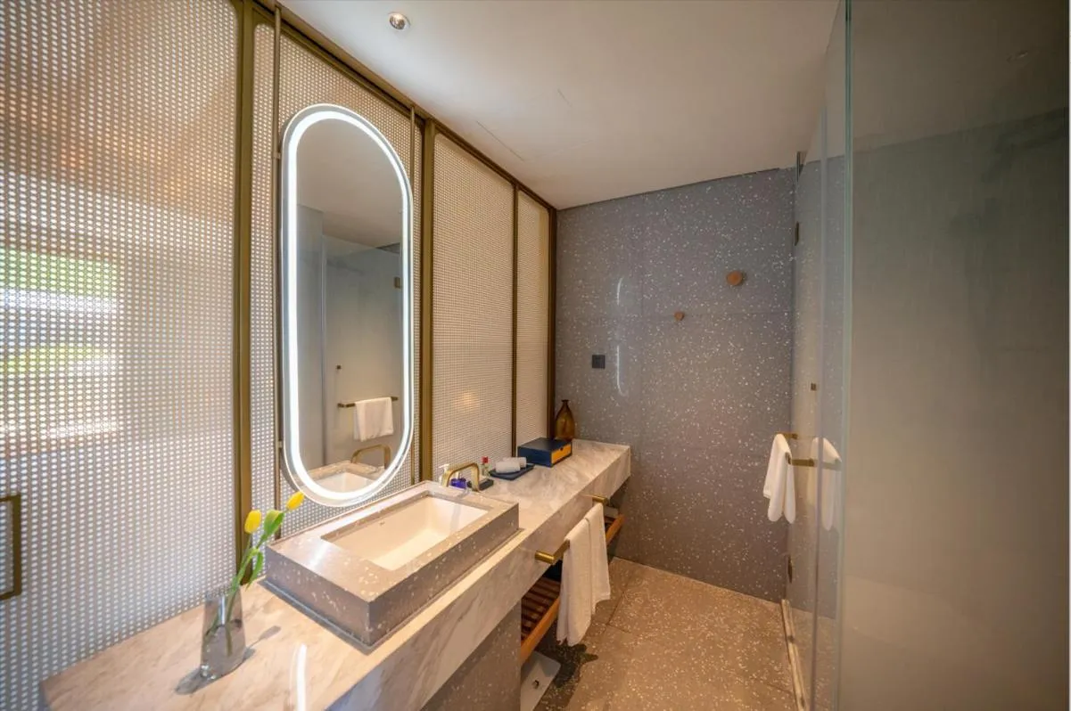 Bathroom in voco Nanjing Garden Expo by IHG