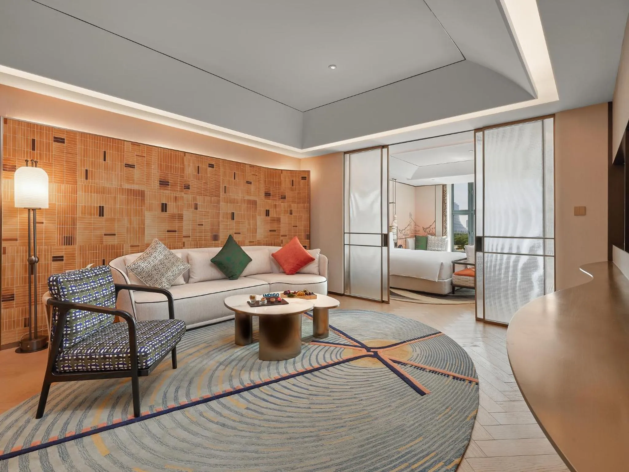 Living room, Bed in Hotel Indigo Xiamen Haicang by IHG