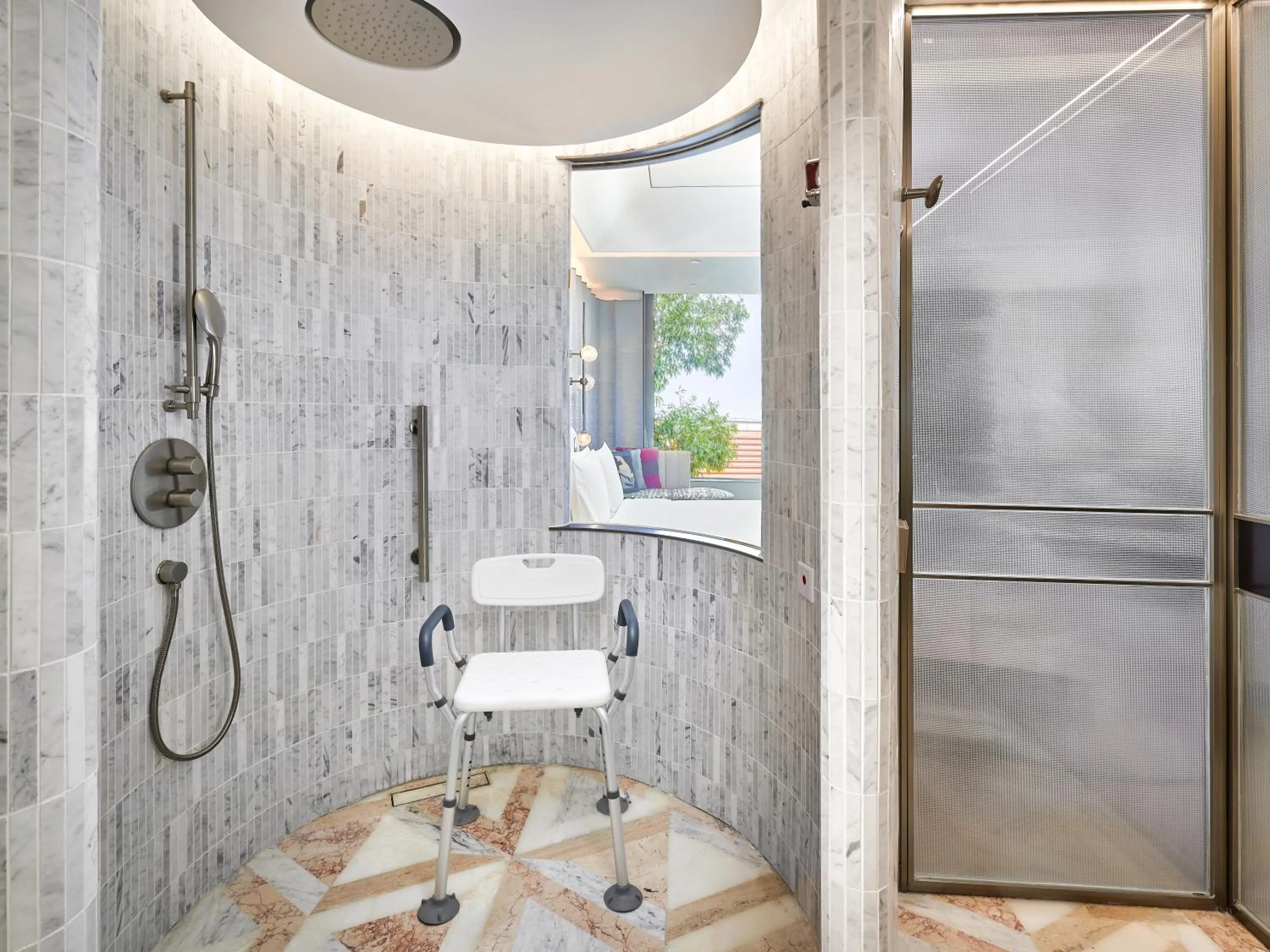 Shower in Hotel Indigo Xiamen Haicang by IHG
