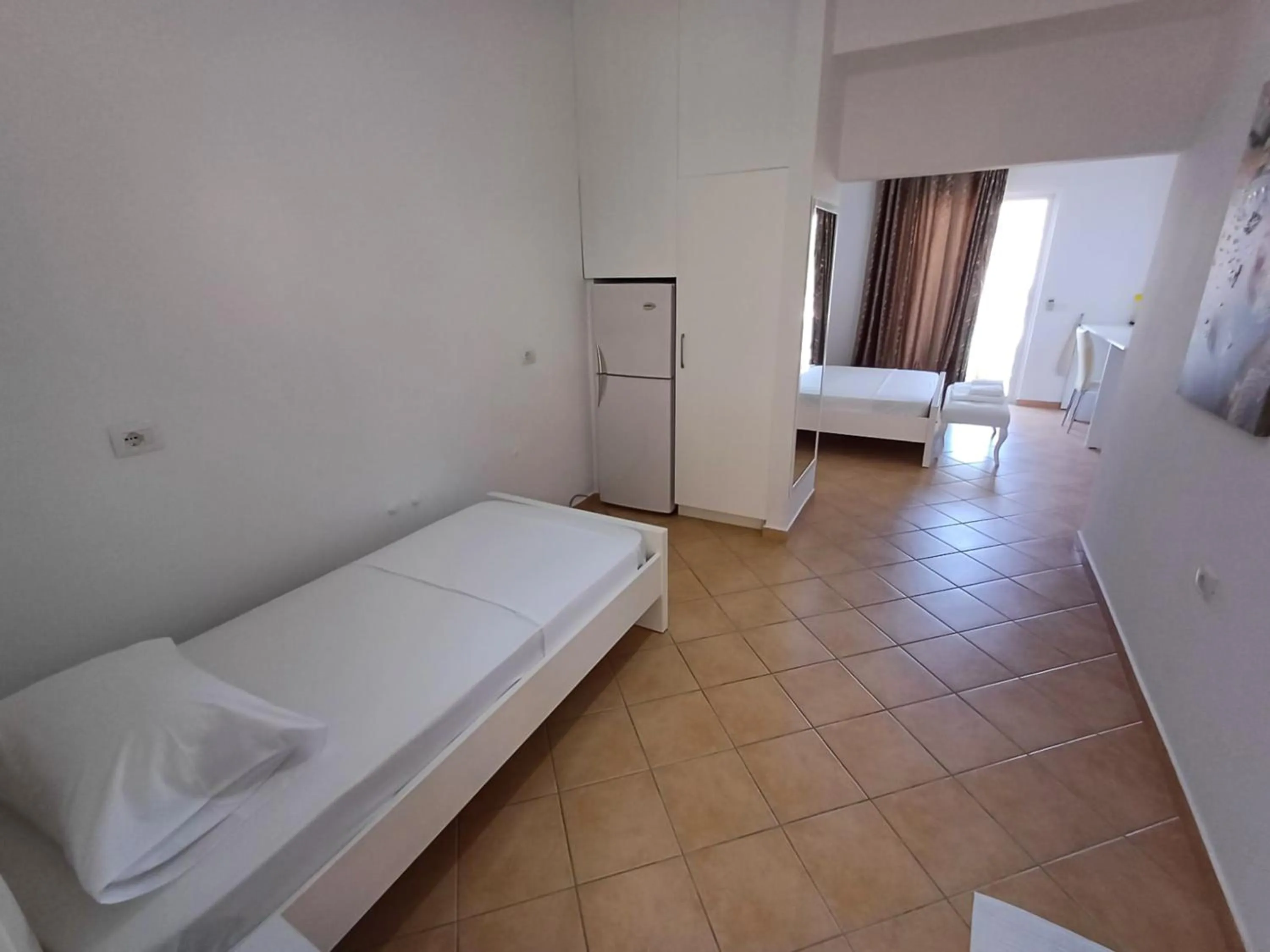 Bed in Hotel Sherifi