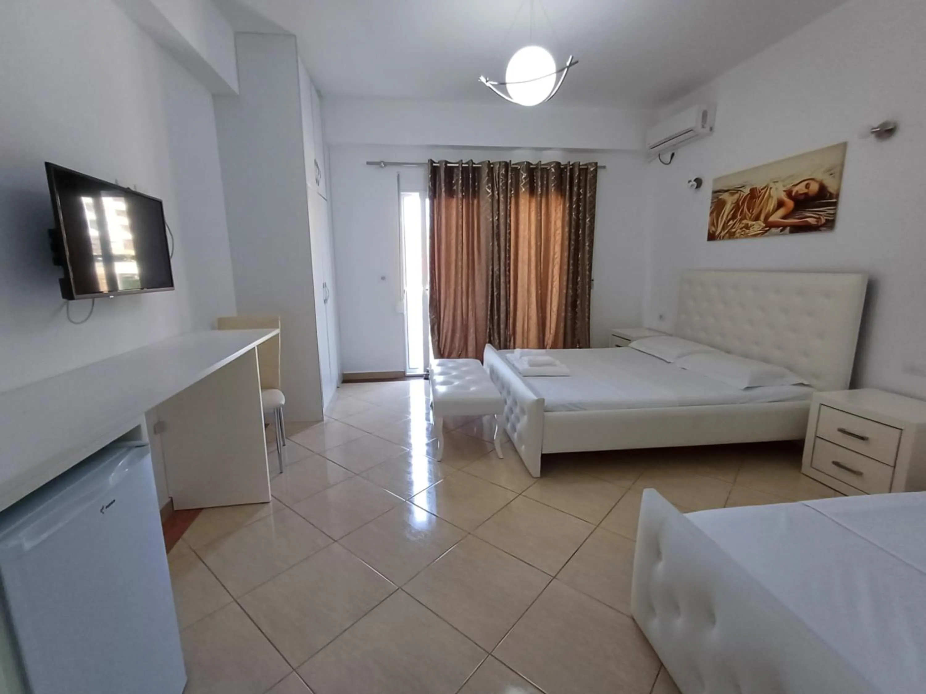 Bed in Hotel Sherifi