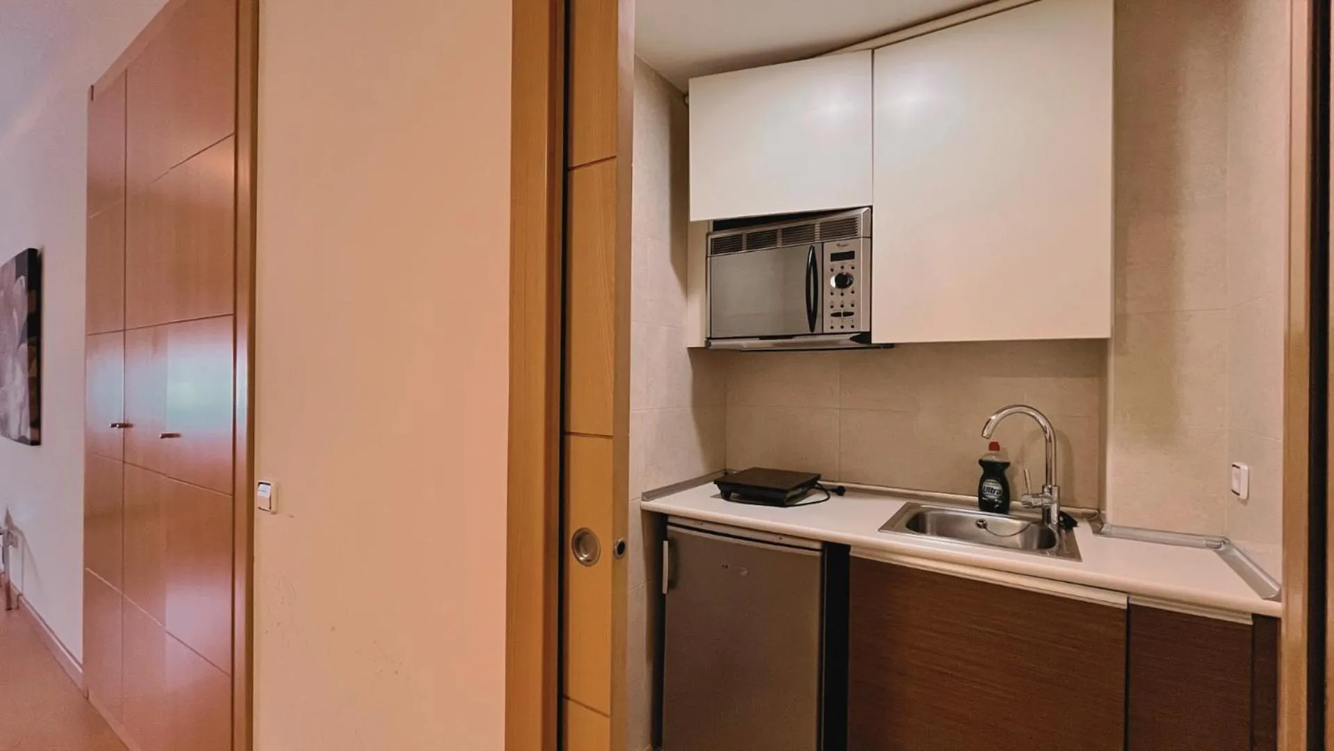 Kitchen or kitchenette in Hotel-Apartamentos Tartesos