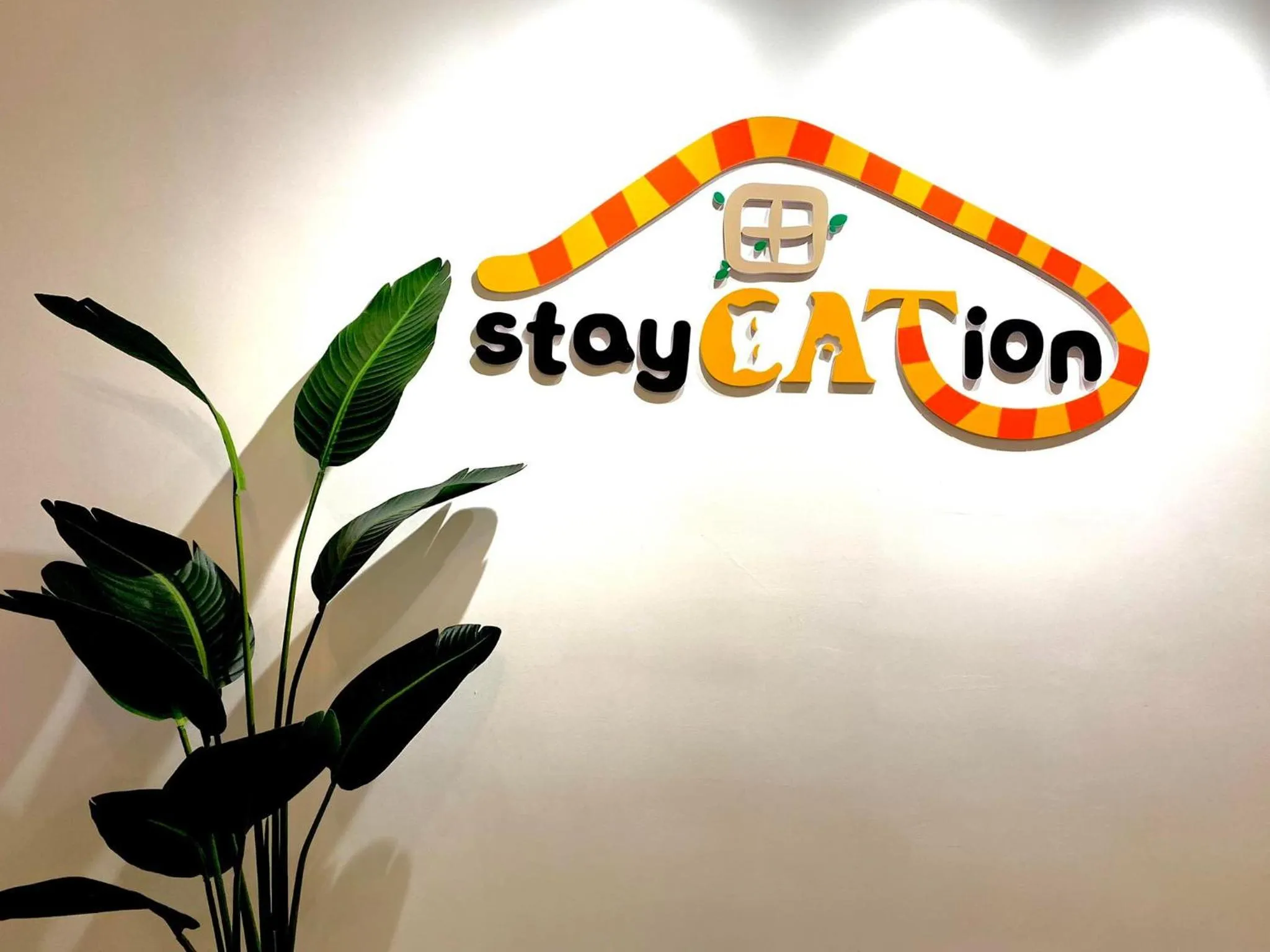 Property logo or sign in Tropicana 218 Macalister Sea & City View by stayCATion Homestay