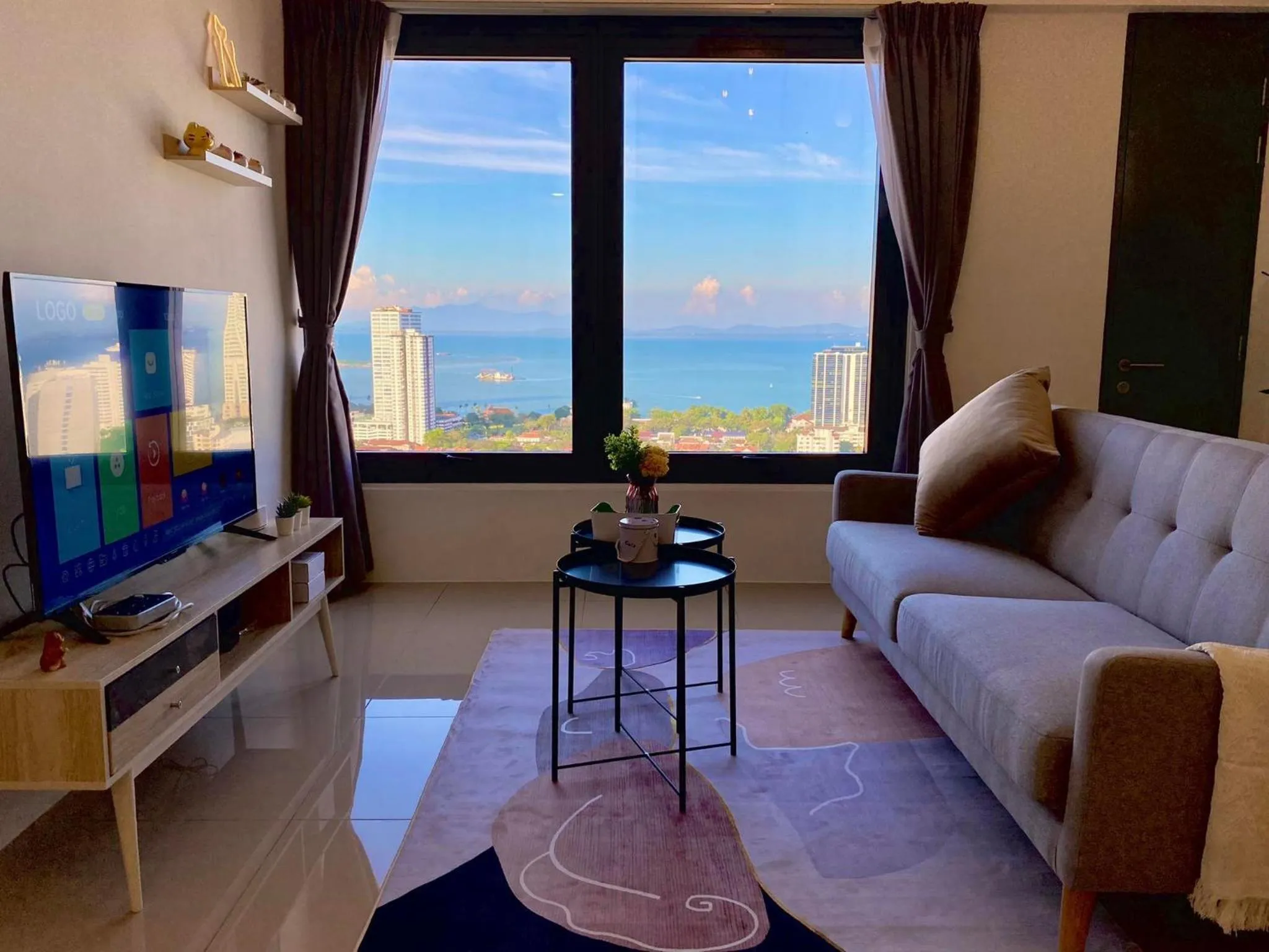 TV and multimedia in Tropicana 218 Macalister Sea & City View by stayCATion Homestay