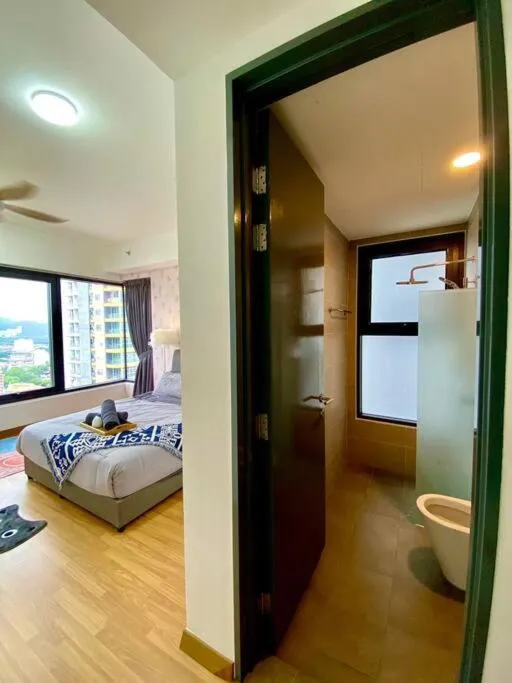 Bed in Tropicana 218 Macalister Sea & City View by stayCATion Homestay