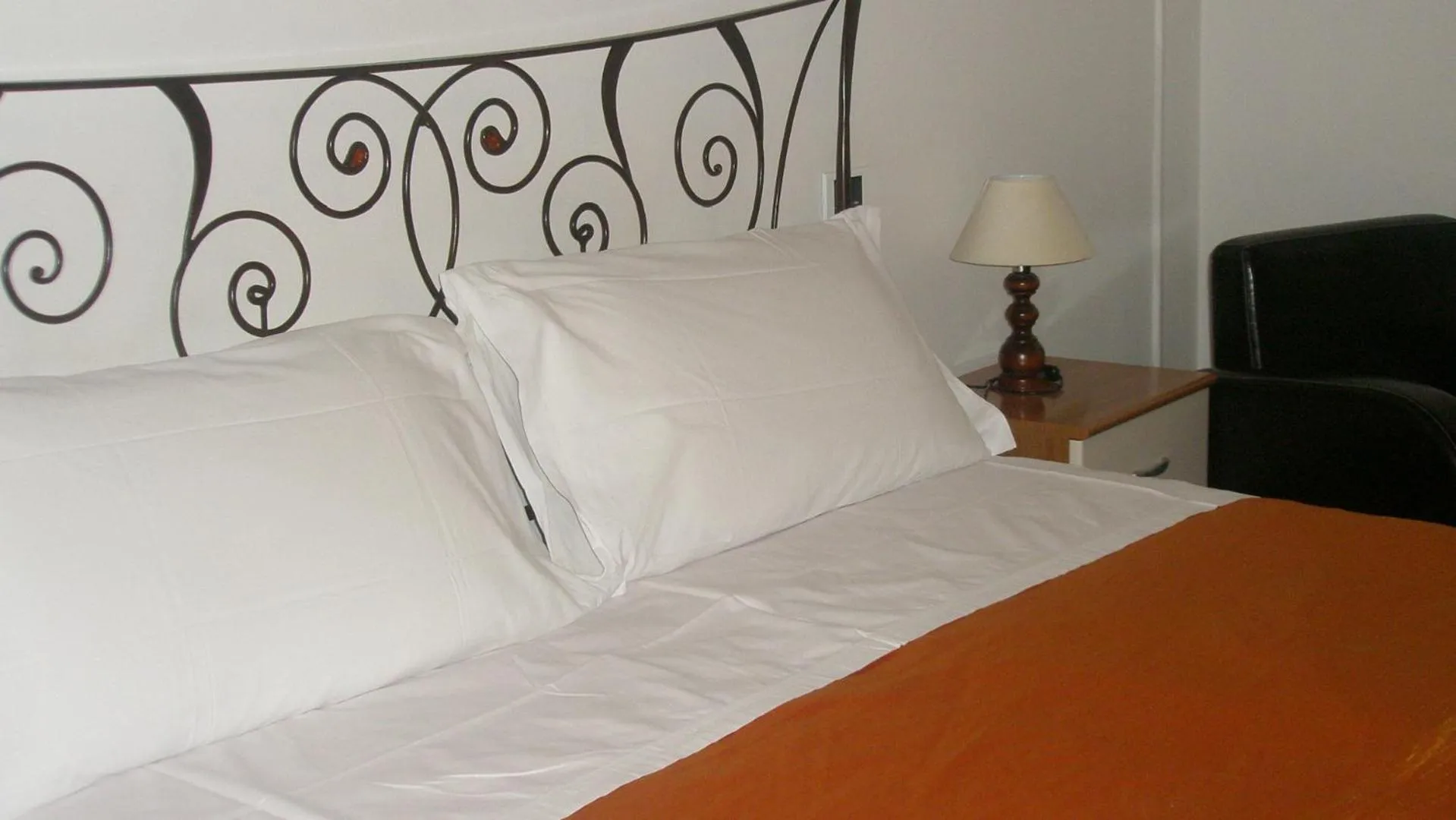 Bed in Hotel Athena