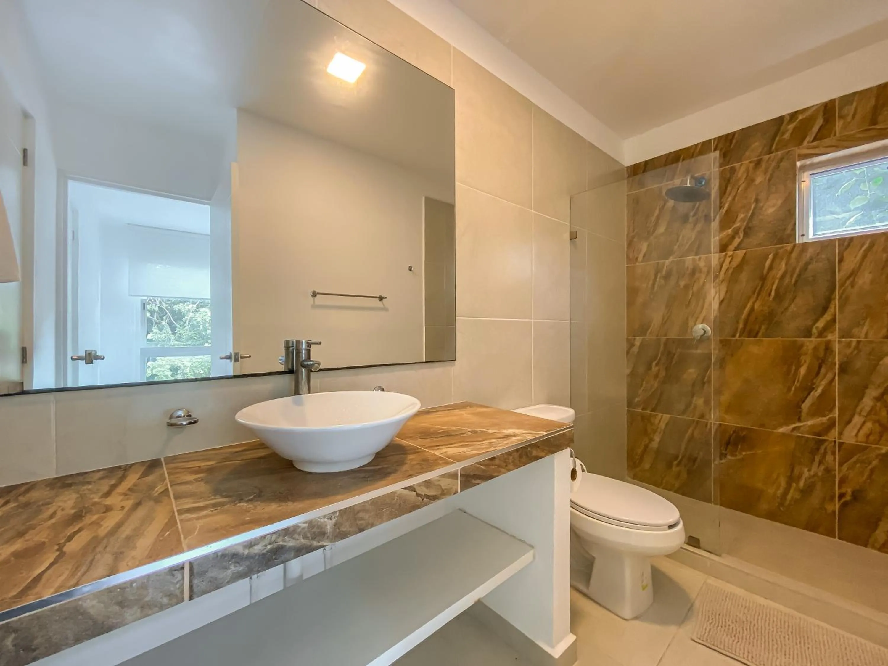 Bathroom in Oceanblue by Andiani Travel