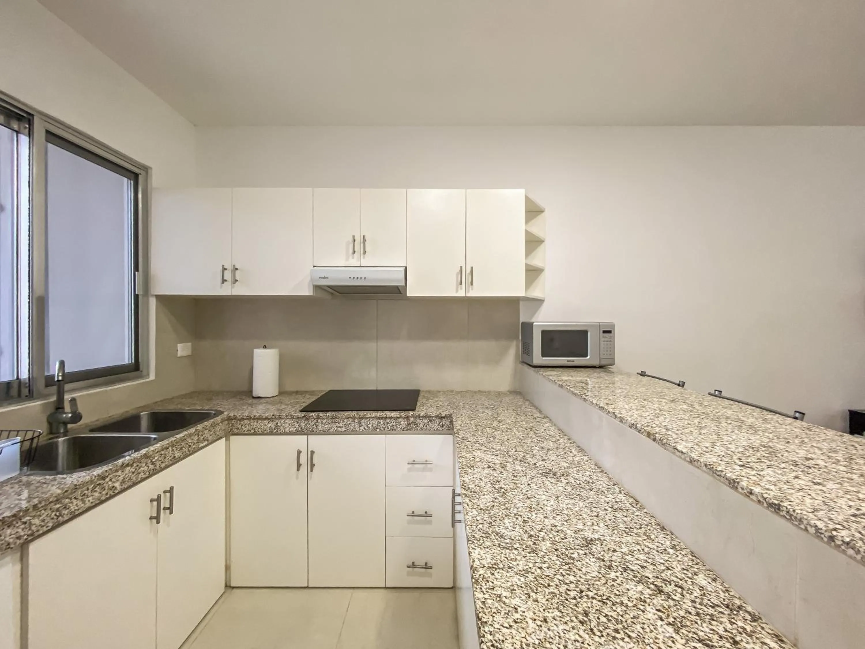 Kitchen or kitchenette in Oceanblue by Andiani Travel