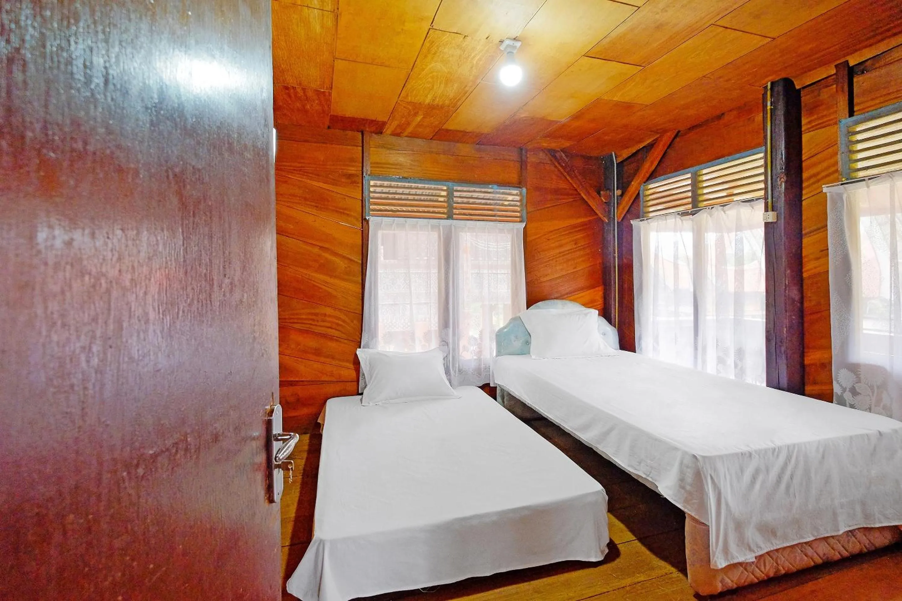 Bedroom in Hotel O Tatto Bara Homestay Near Tongkonan Payung Pangden