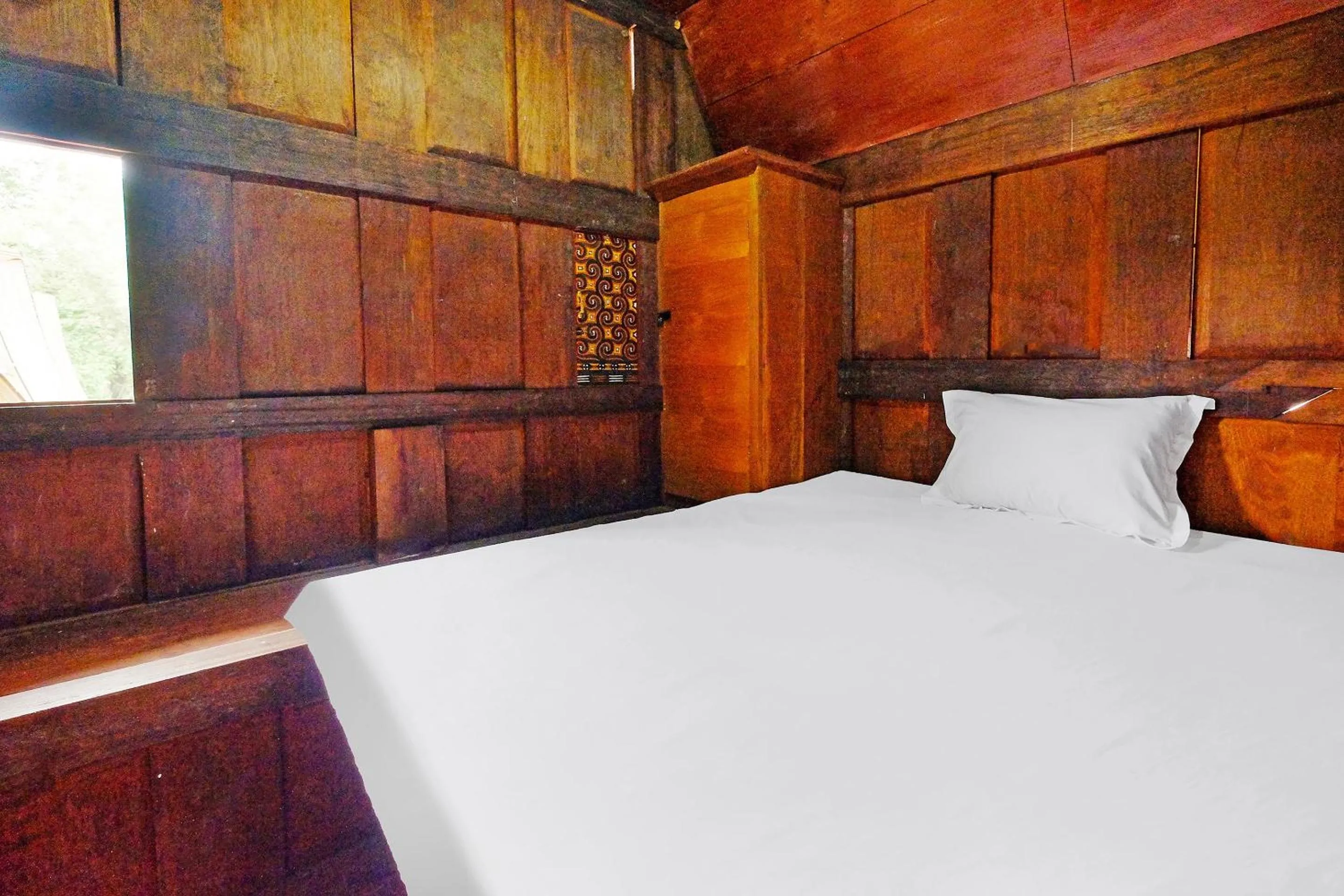 Bedroom in Hotel O Tatto Bara Homestay Near Tongkonan Payung Pangden