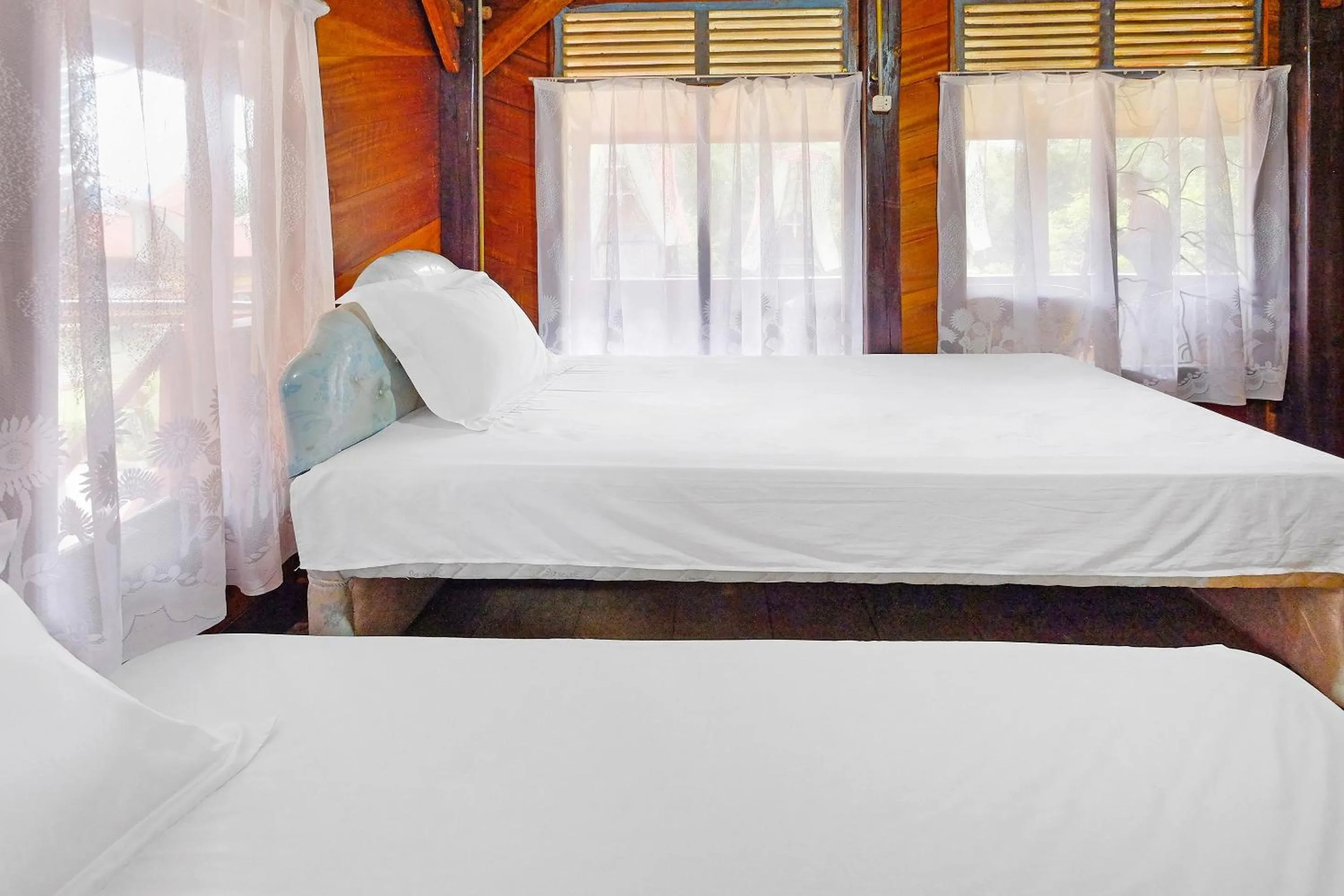 Bedroom in Hotel O Tatto Bara Homestay Near Tongkonan Payung Pangden