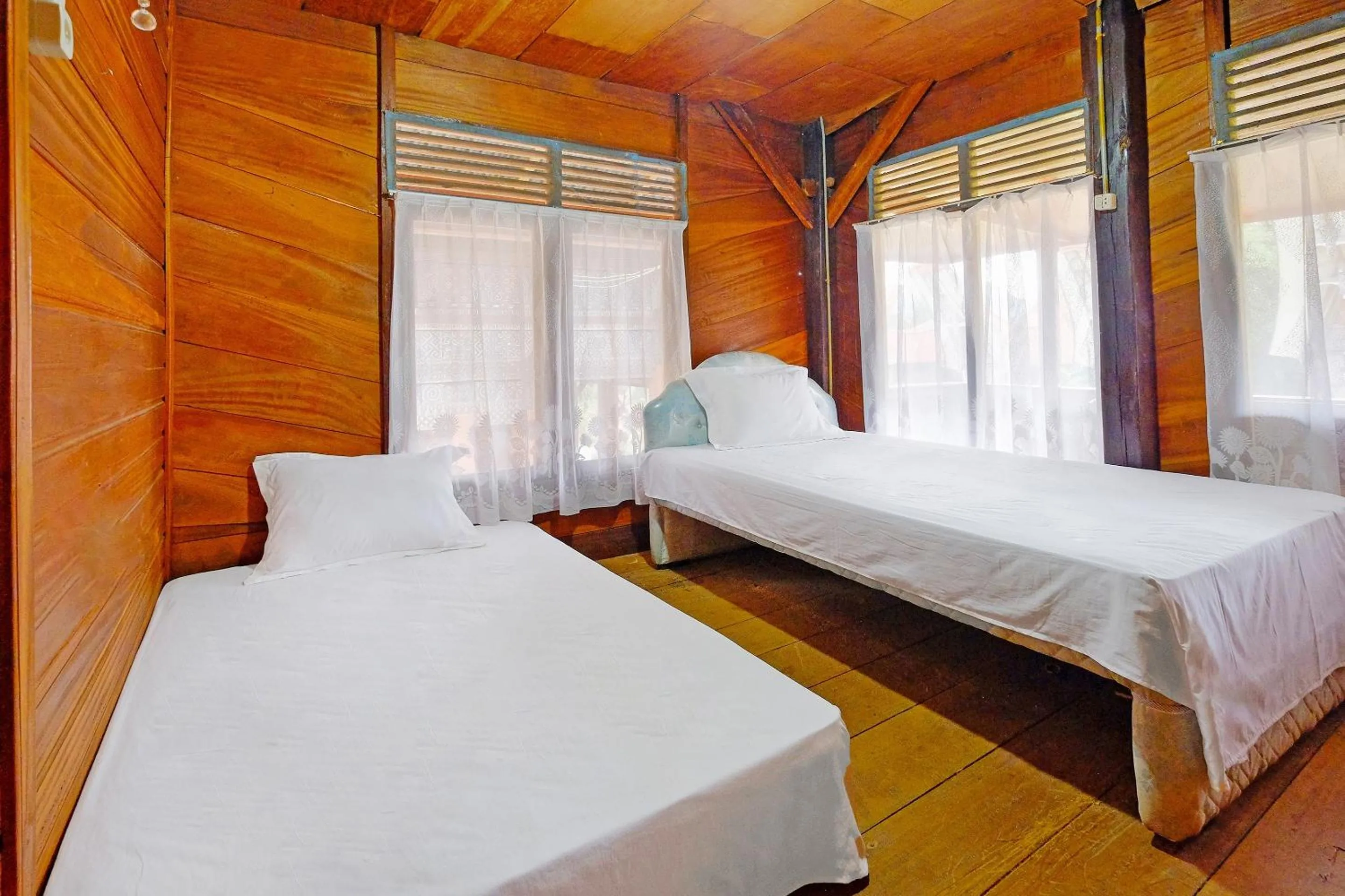 Bedroom in Hotel O Tatto Bara Homestay Near Tongkonan Payung Pangden