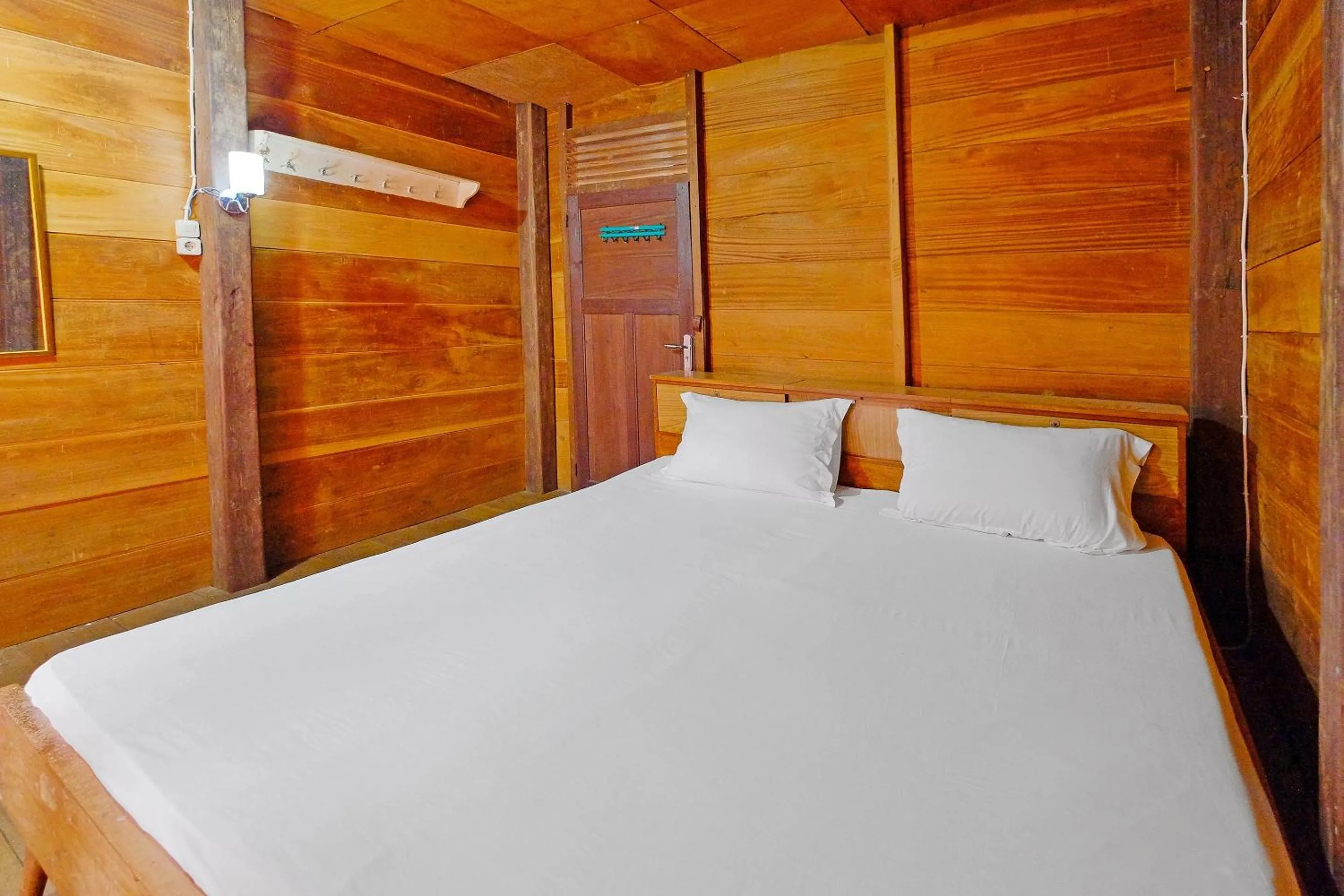 Bedroom in Hotel O Tatto Bara Homestay Near Tongkonan Payung Pangden