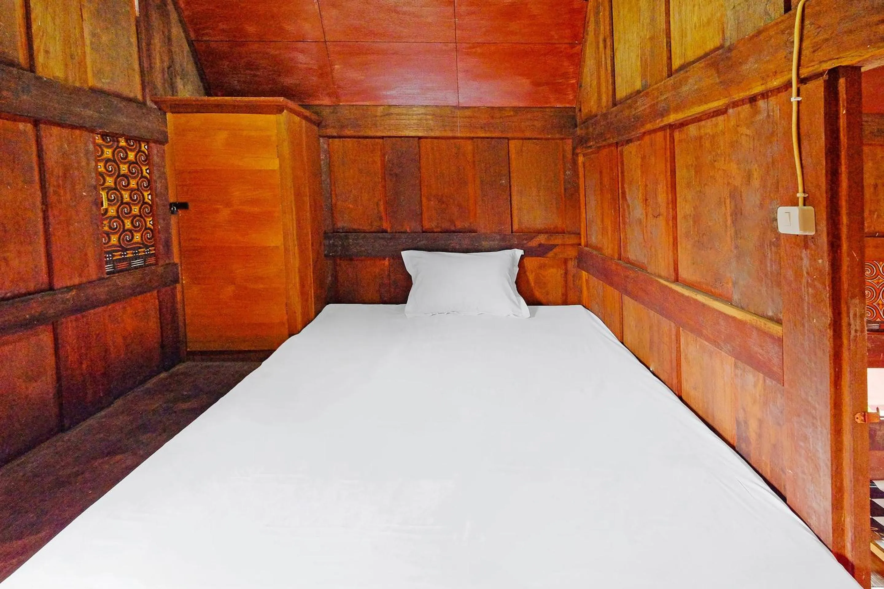 Bedroom in Hotel O Tatto Bara Homestay Near Tongkonan Payung Pangden