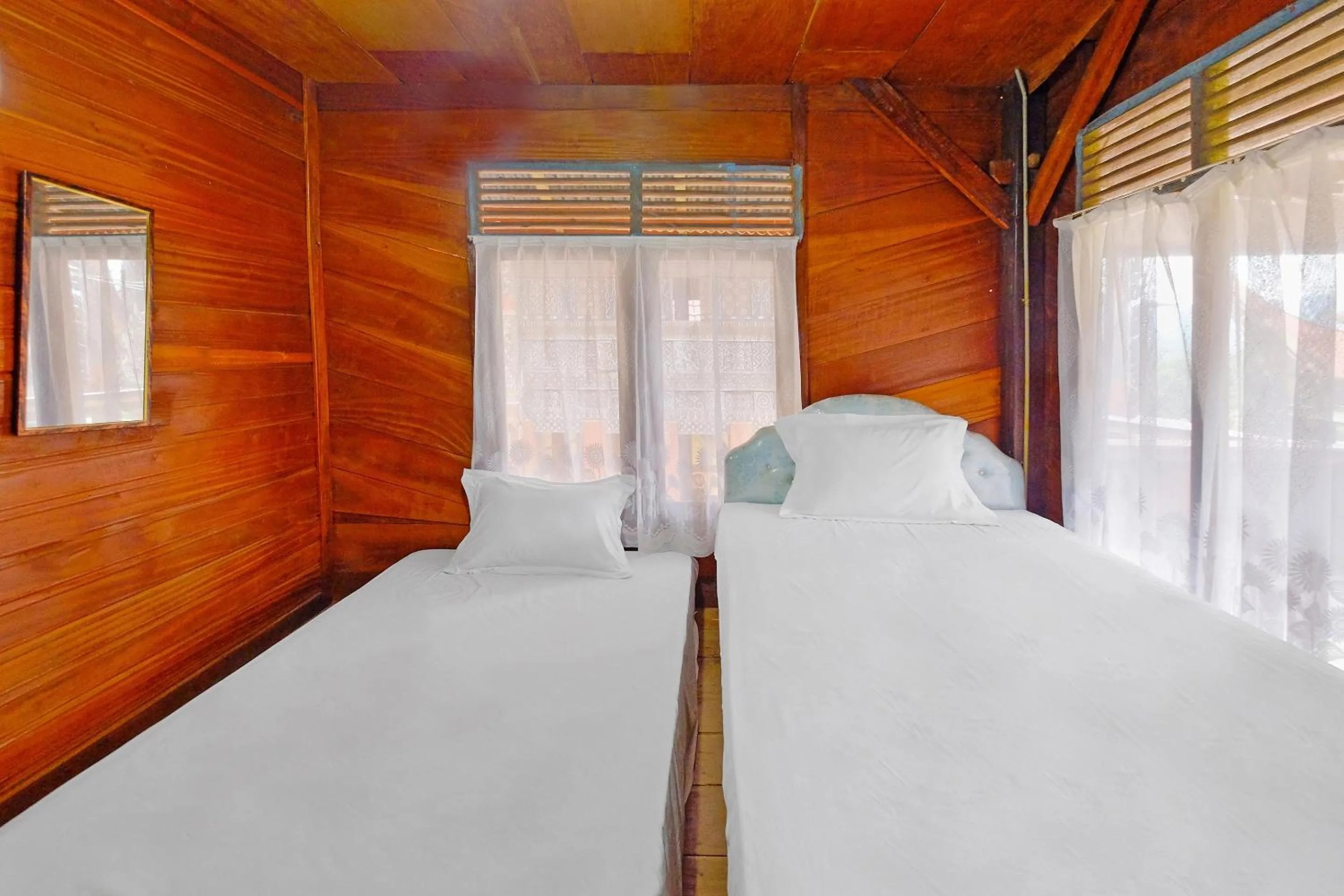 Bedroom in Hotel O Tatto Bara Homestay Near Tongkonan Payung Pangden