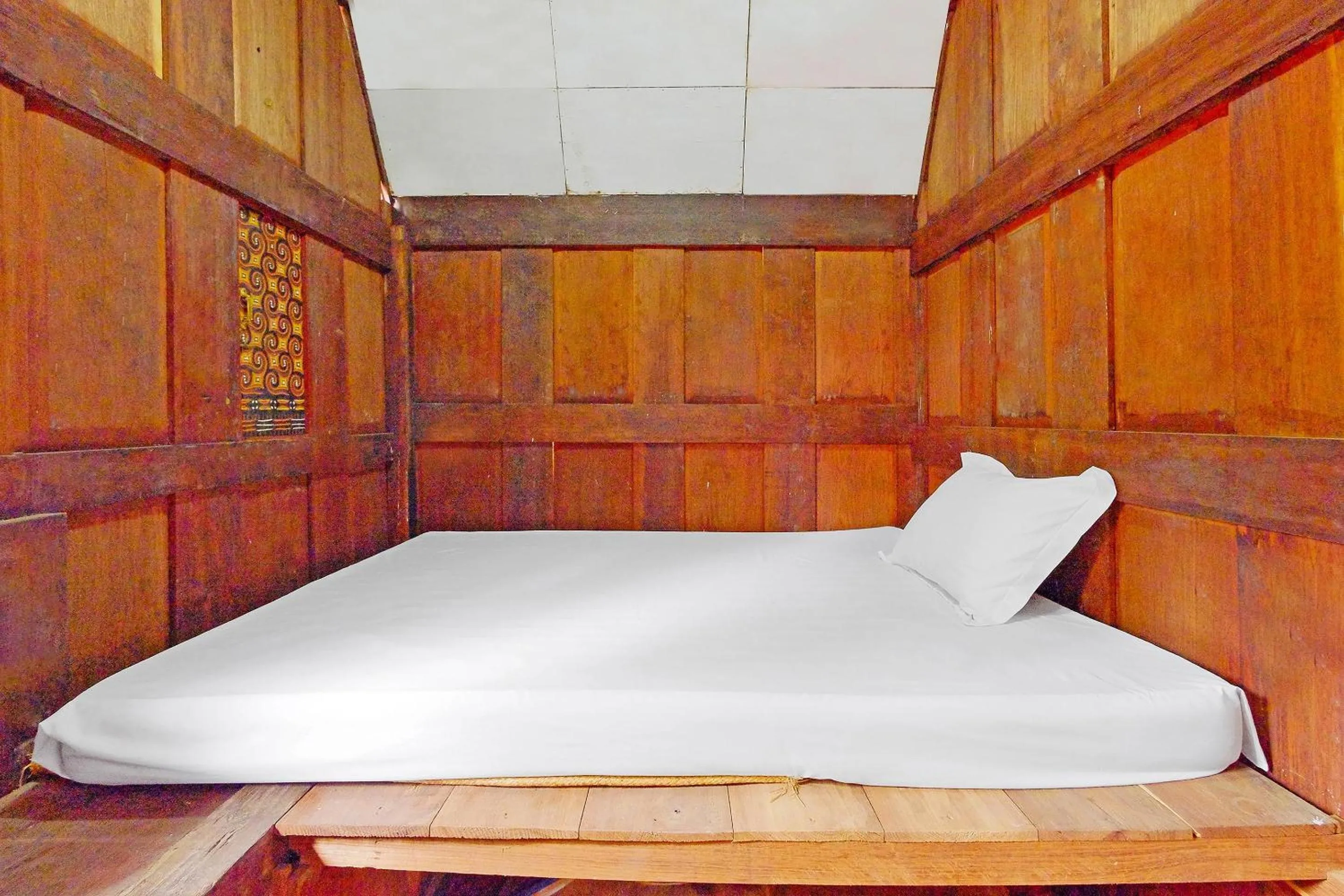 Bedroom in Hotel O Tatto Bara Homestay Near Tongkonan Payung Pangden