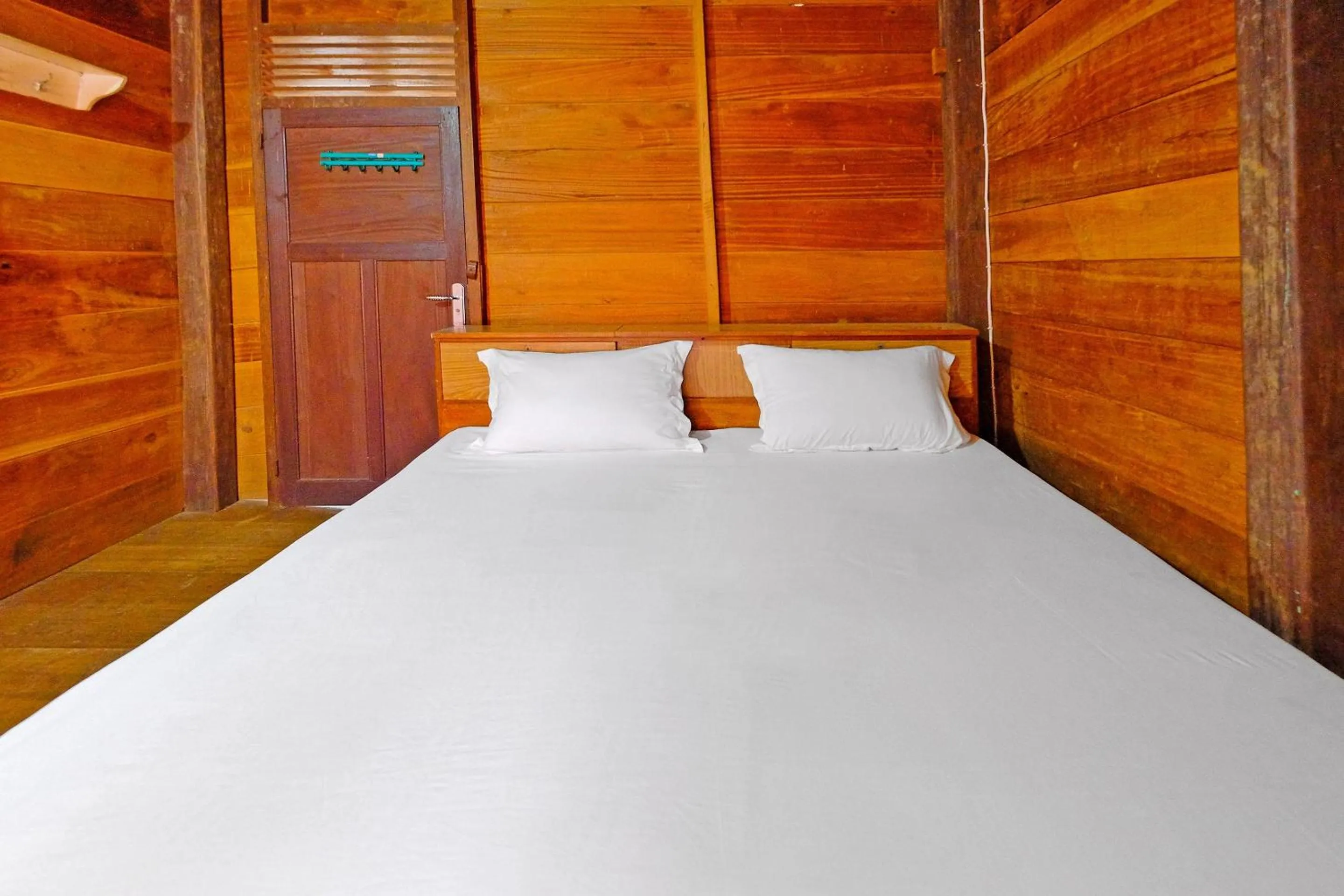 Bedroom in Hotel O Tatto Bara Homestay Near Tongkonan Payung Pangden