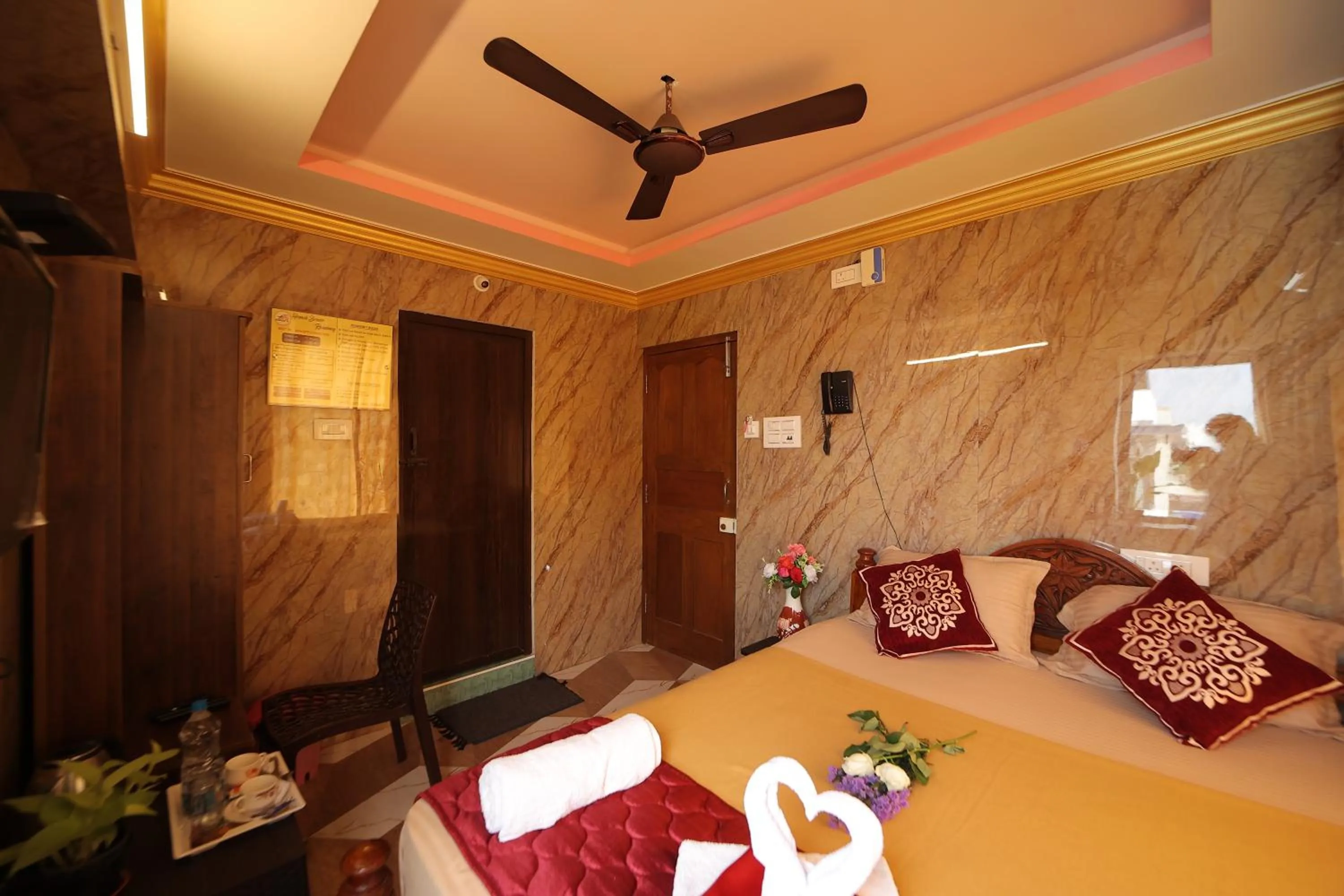 Bed in French Breeze Residency