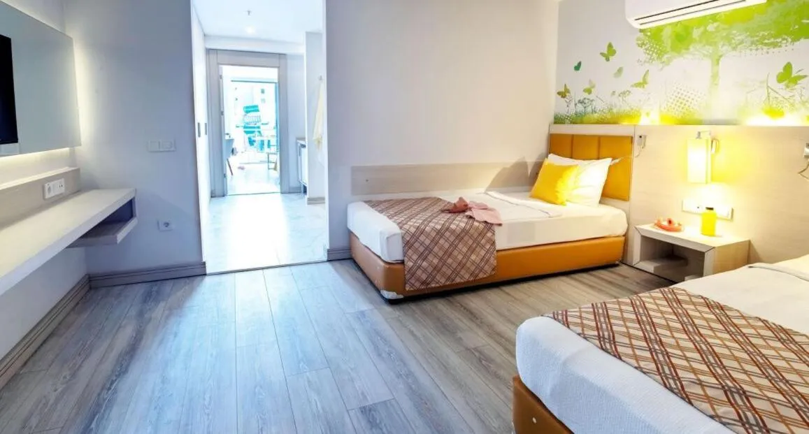 Bed in CLUB AQUA PLAZA