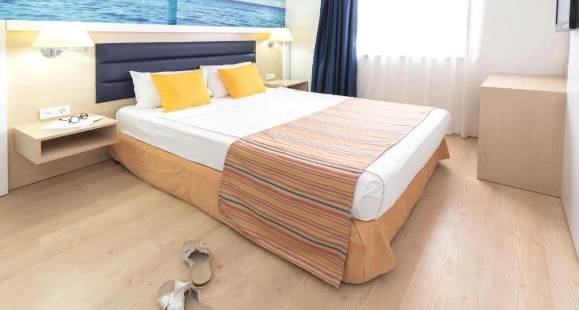 Bed in CLUB AQUA PLAZA