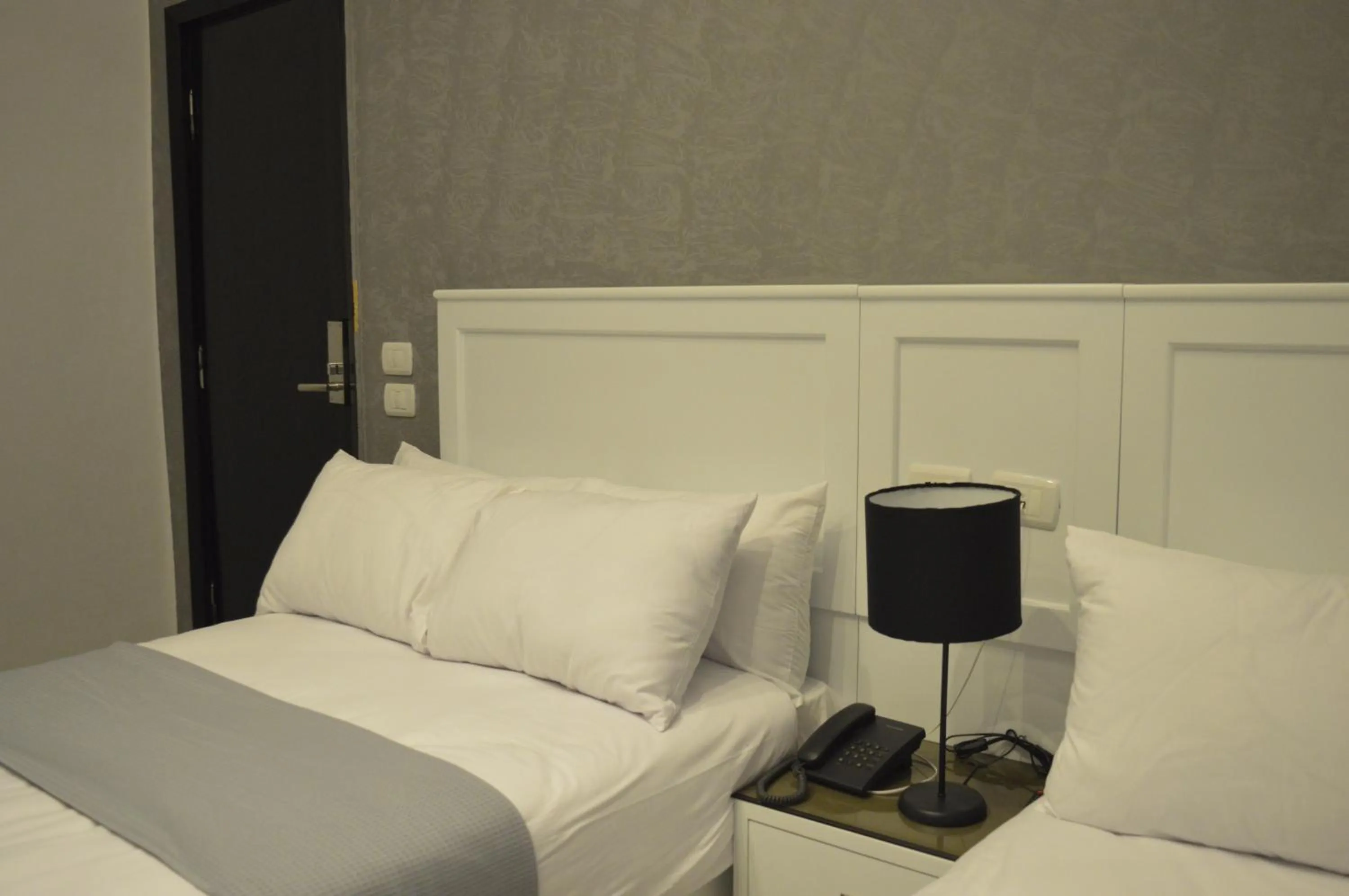 Bed in Nile Villa Hotel